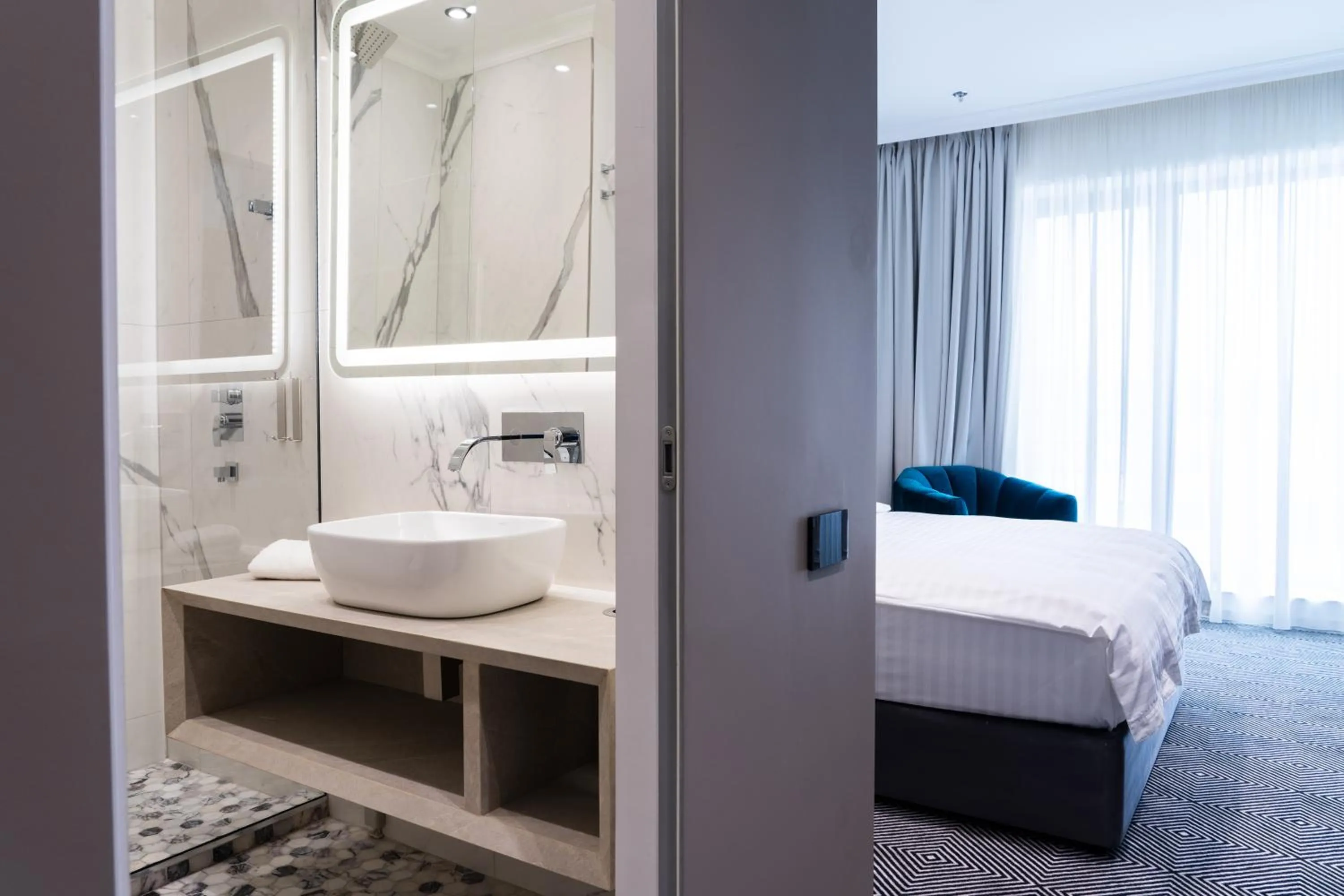 Bathroom, Bed in Sky Airport Hotel