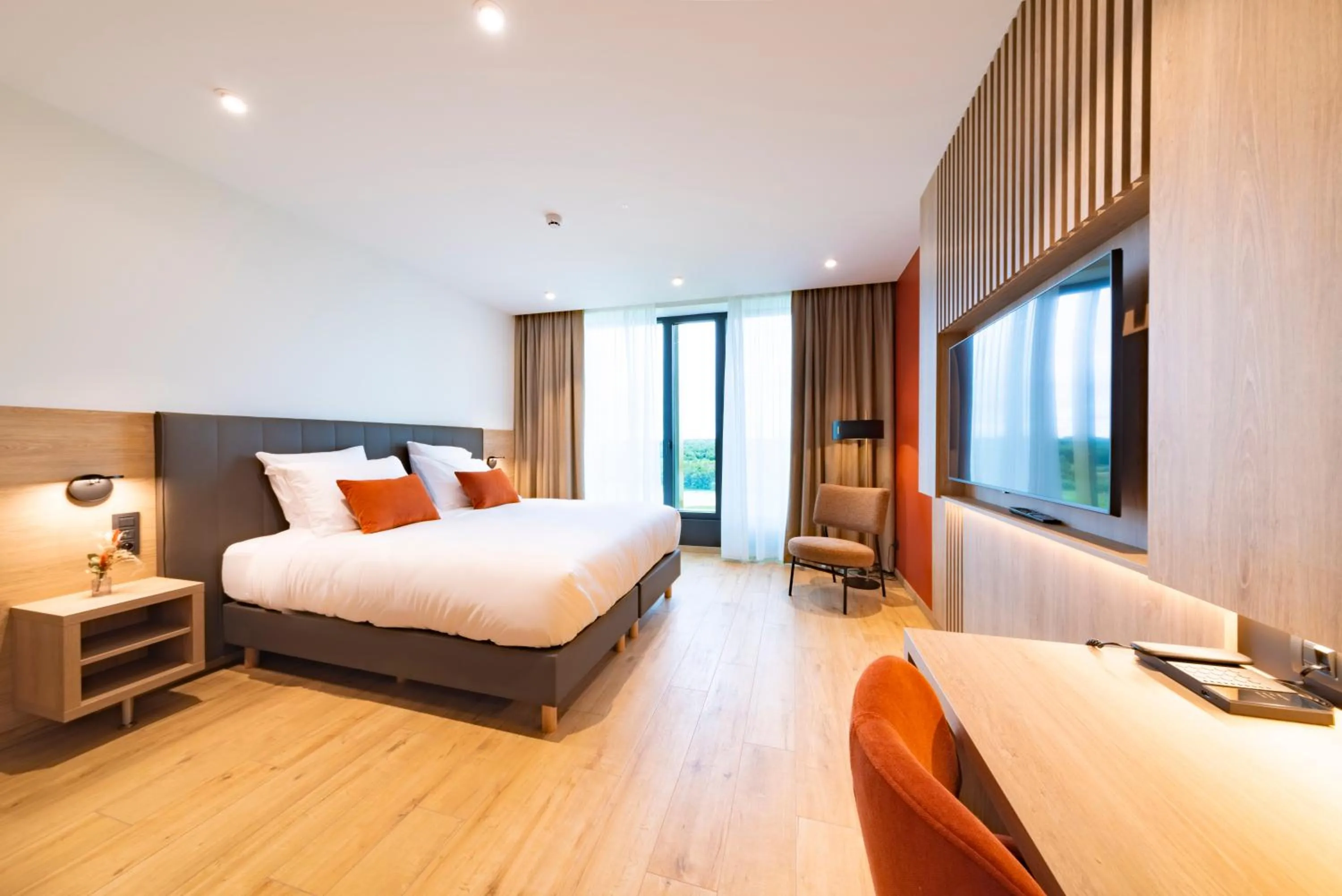 Bed in Hotel du Bois d'Arlon