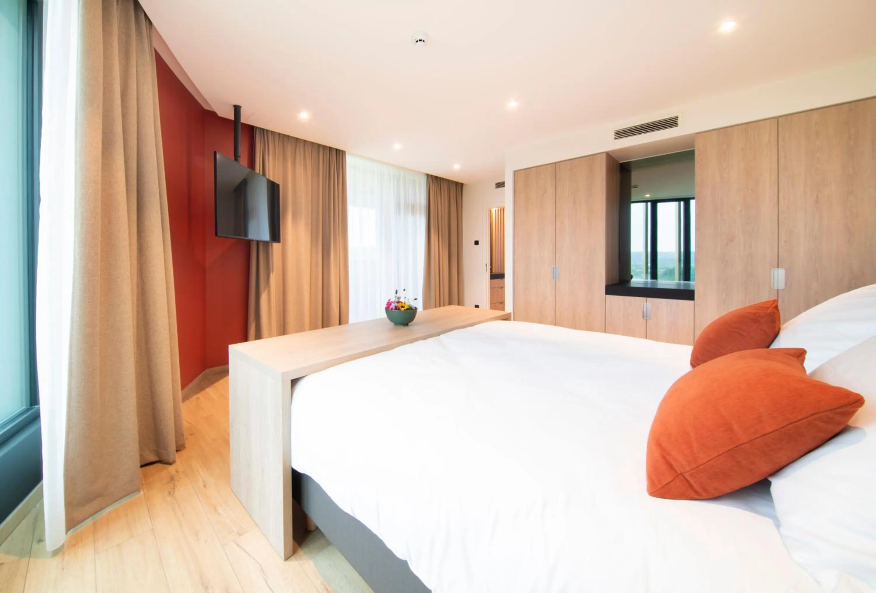 Bed in Hotel du Bois d'Arlon