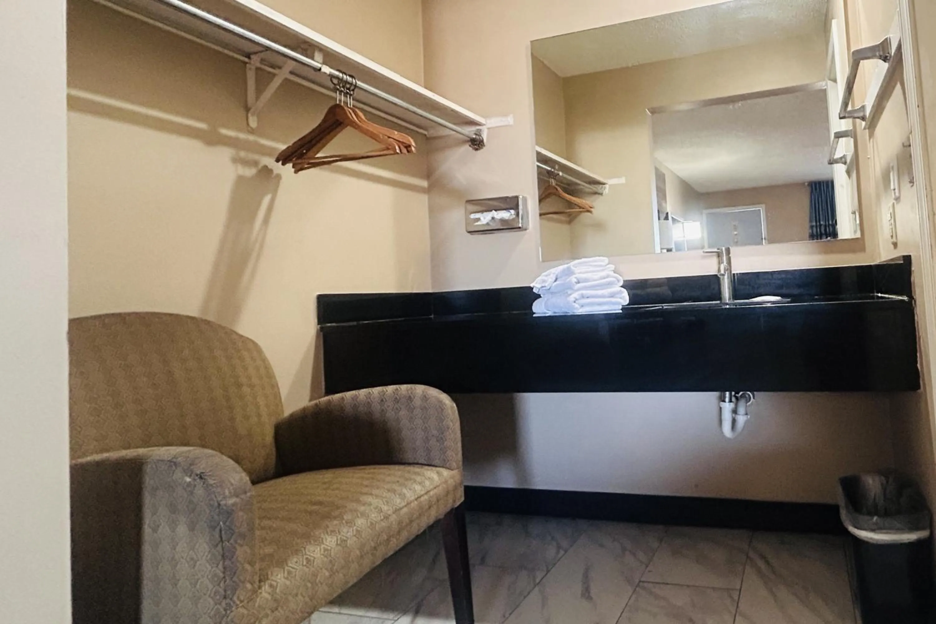 Bedroom in Residential Suites Blue Springs by Hotel O I 70