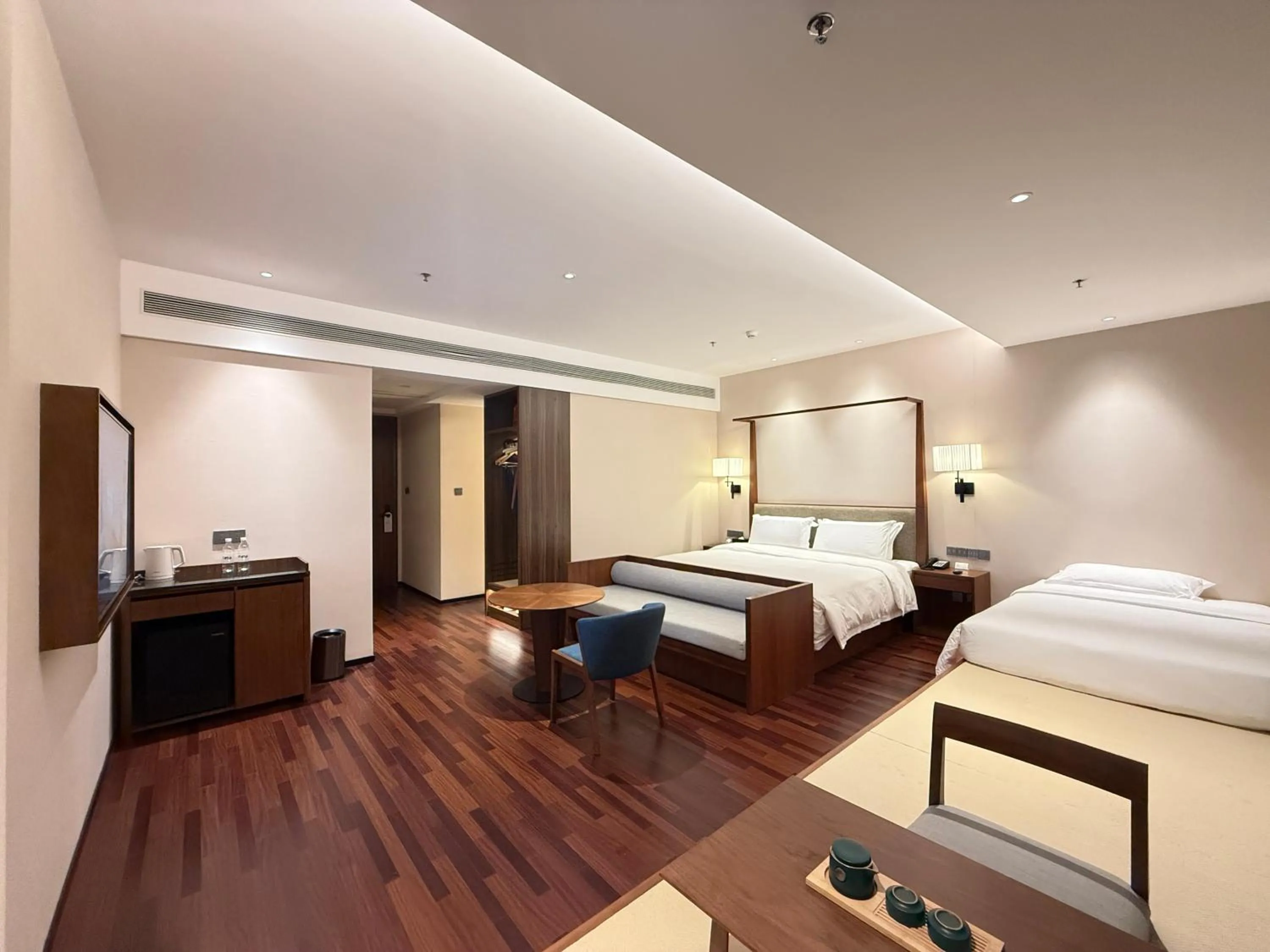 Bed in SSAW Boutique Hotel Foshan Qiandeng Lake