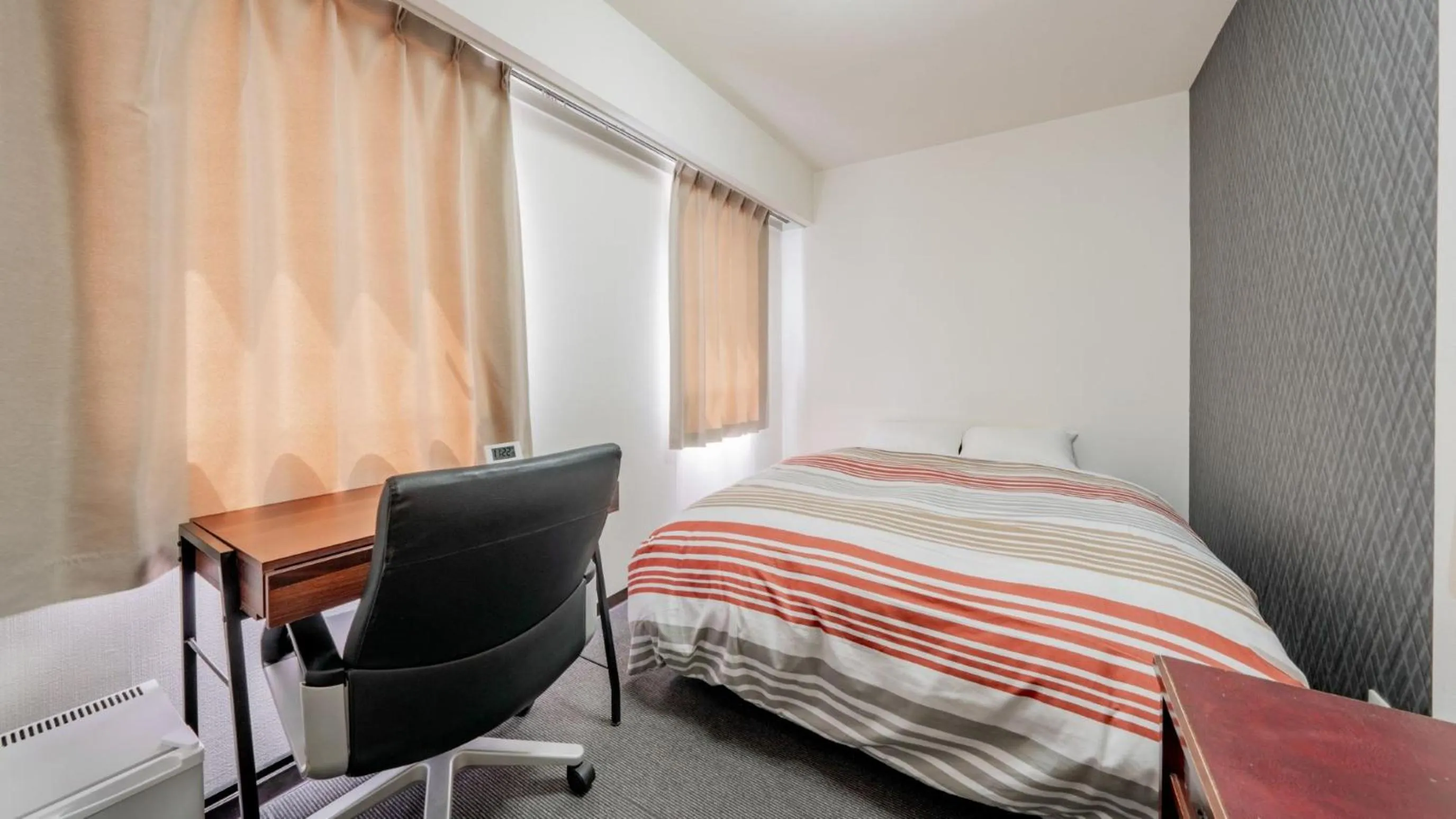 Living room, Bed in Hotel Obihiro Hills