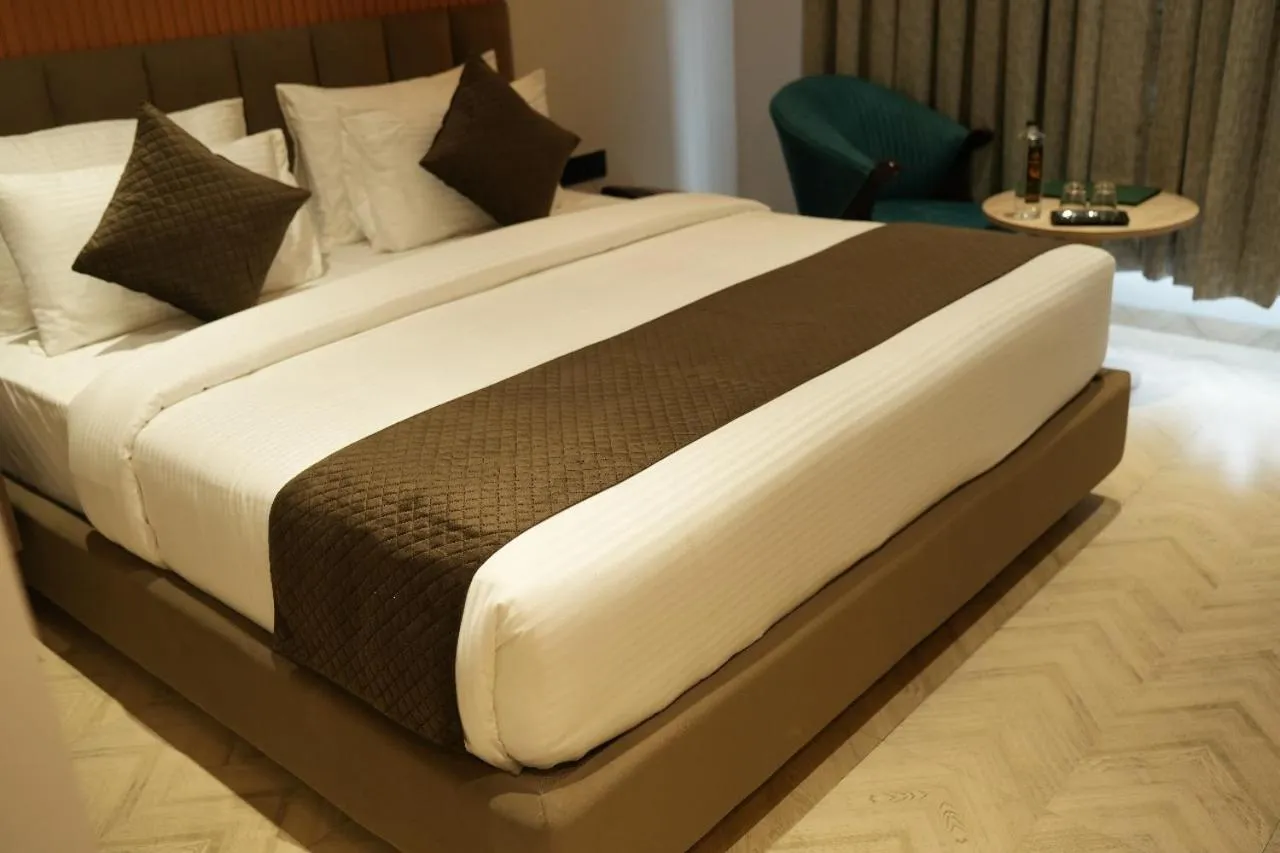 Photo of the whole room, Bed in Narayani Executive