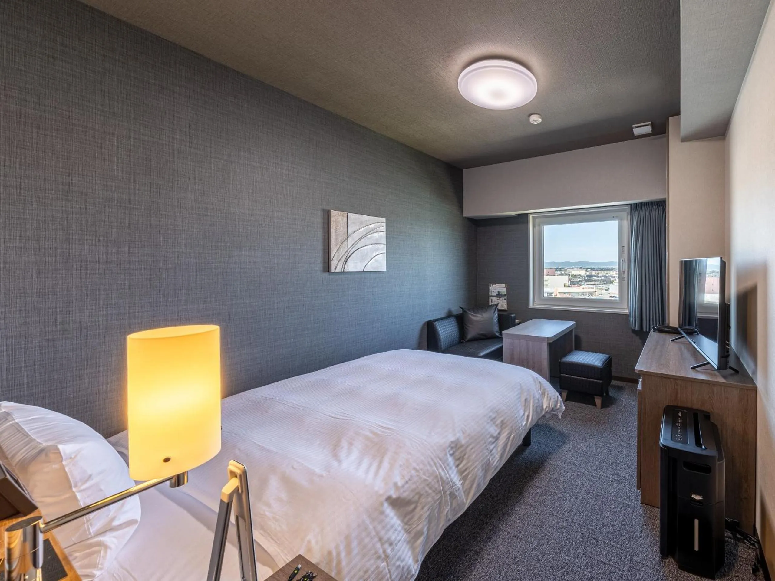 Photo of the whole room, Bed in Hotel Route Inn Tonami Inter