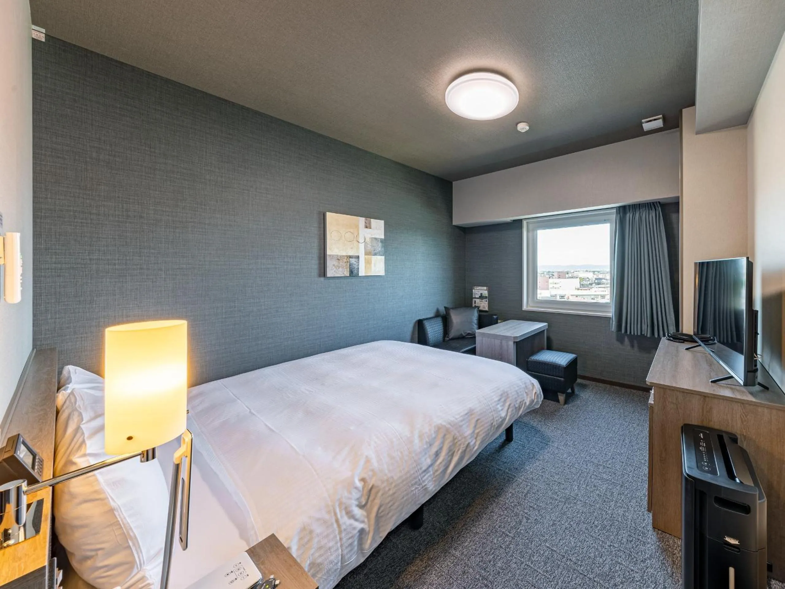 Photo of the whole room, Bed in Hotel Route Inn Tonami Inter