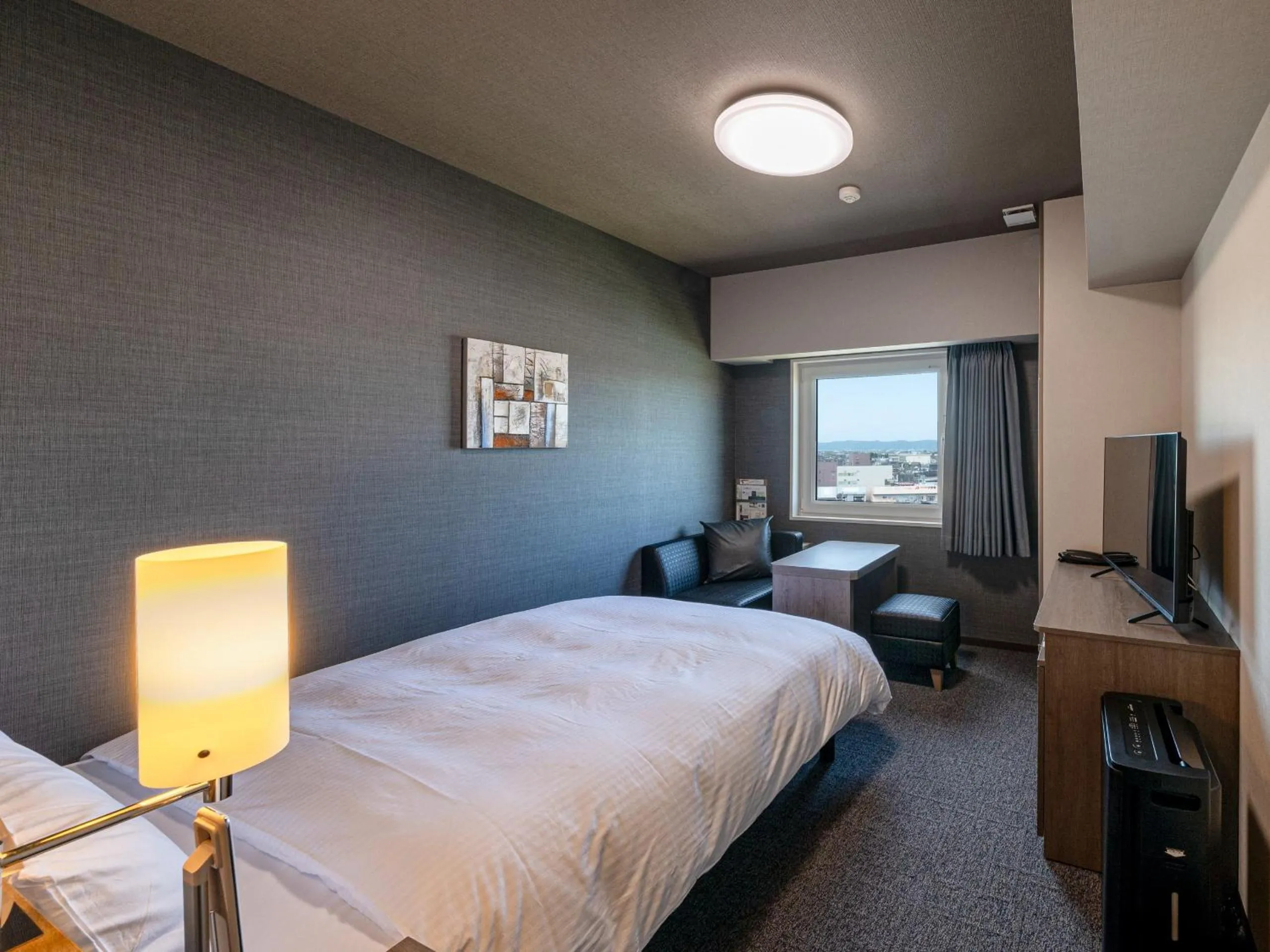 Photo of the whole room, Bed in Hotel Route Inn Tonami Inter