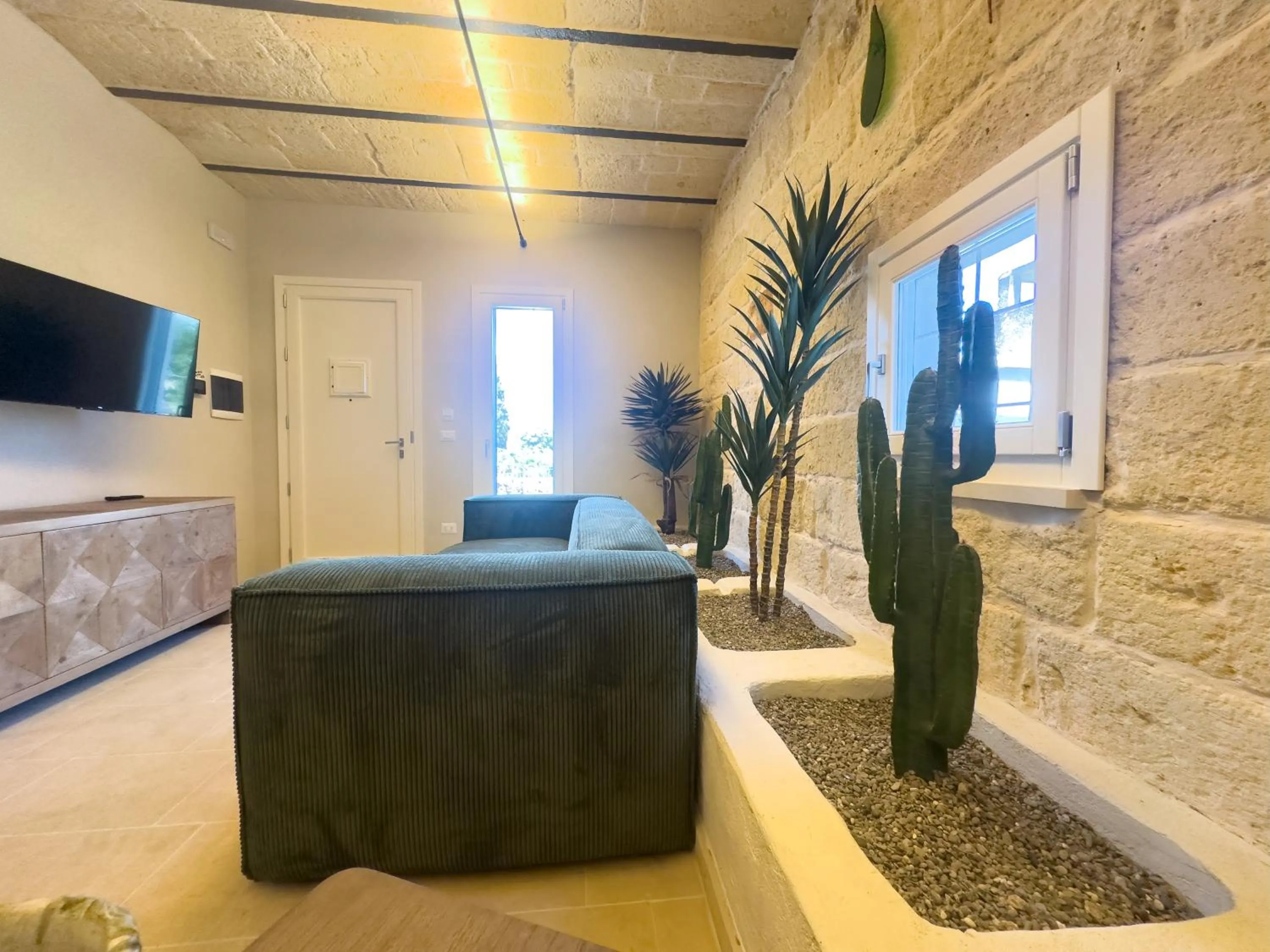 TV and multimedia in Villa Neviera Wine Resort & Spa by Cantine Due Palme