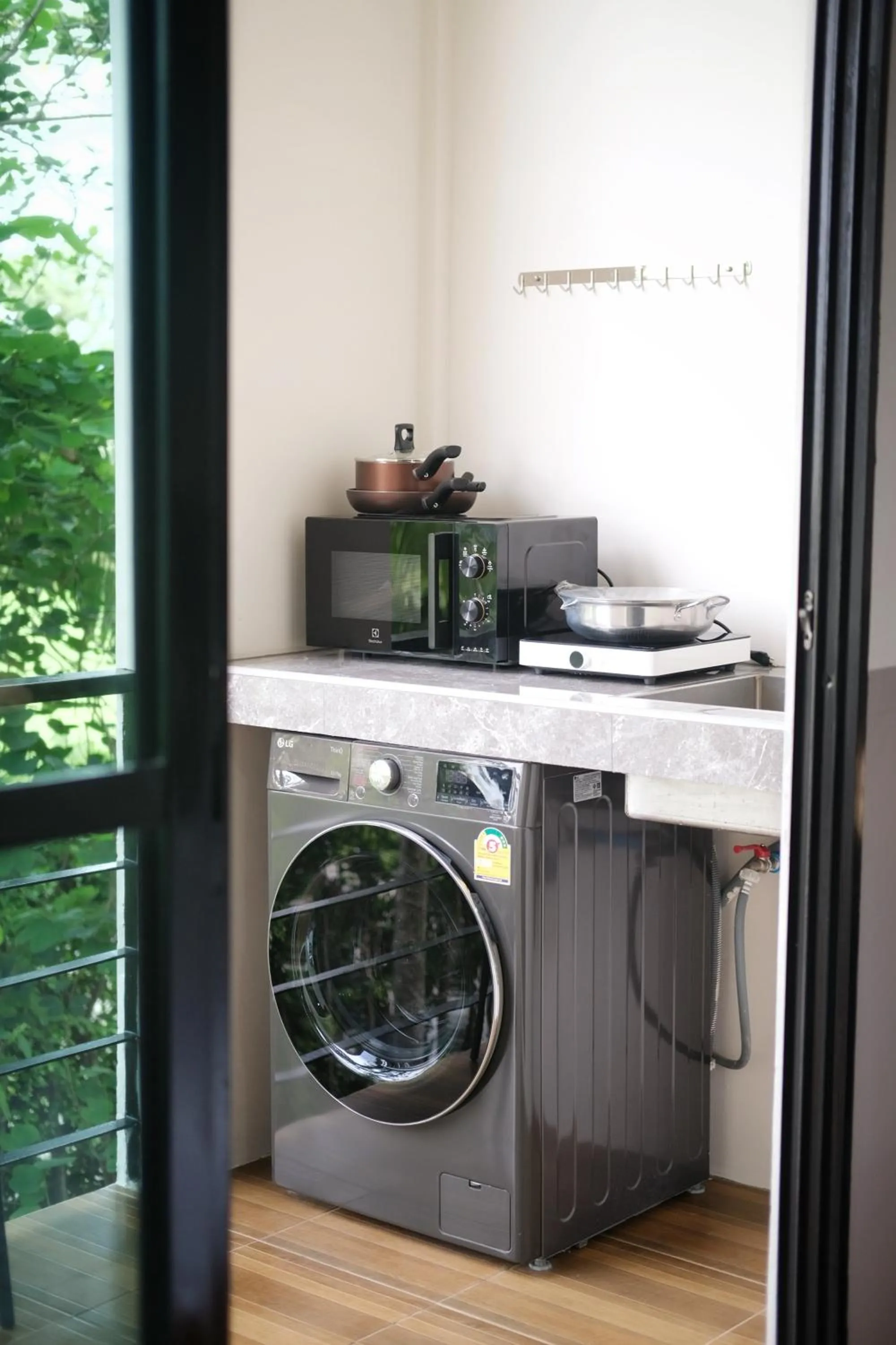 Kitchen or kitchenette in Alisse Stay Phuket Layan