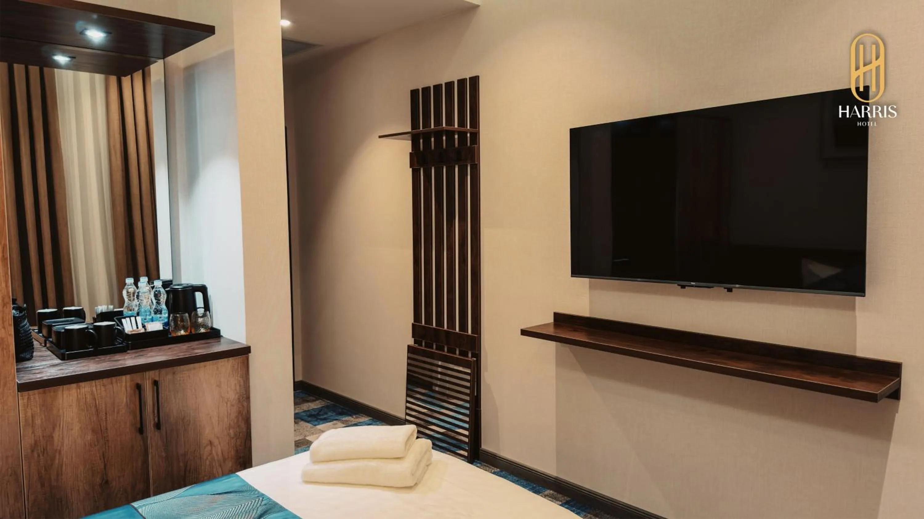 TV and multimedia, Bed in Harris Hotel Spa&Fitness