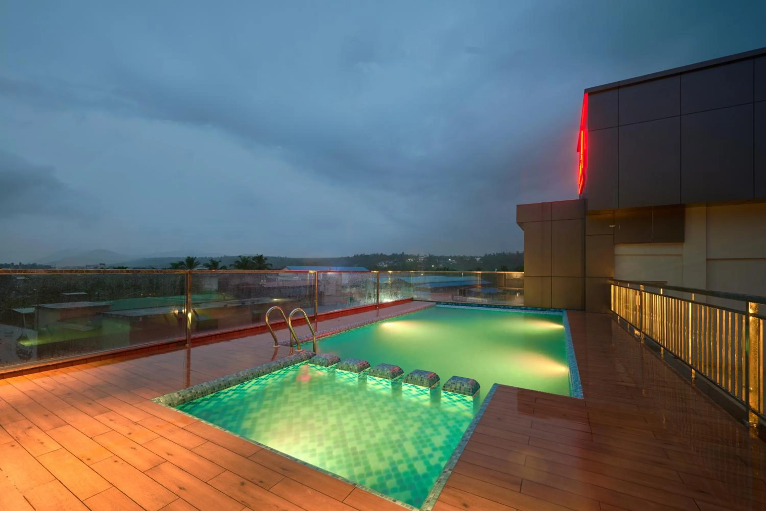 Swimming pool in Kowju Airport Hotel Calicut