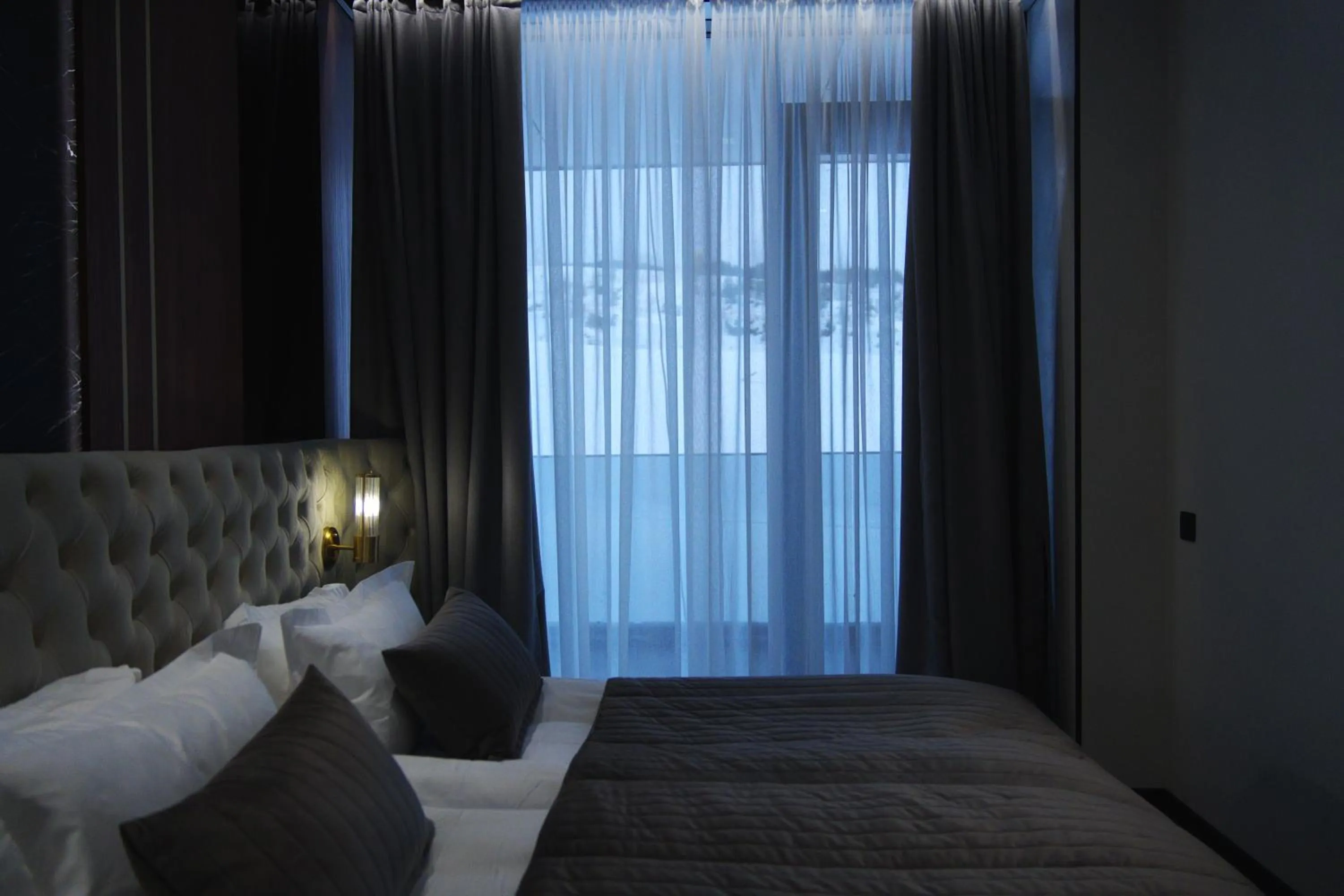 Bed in Glacier Premium Apartments