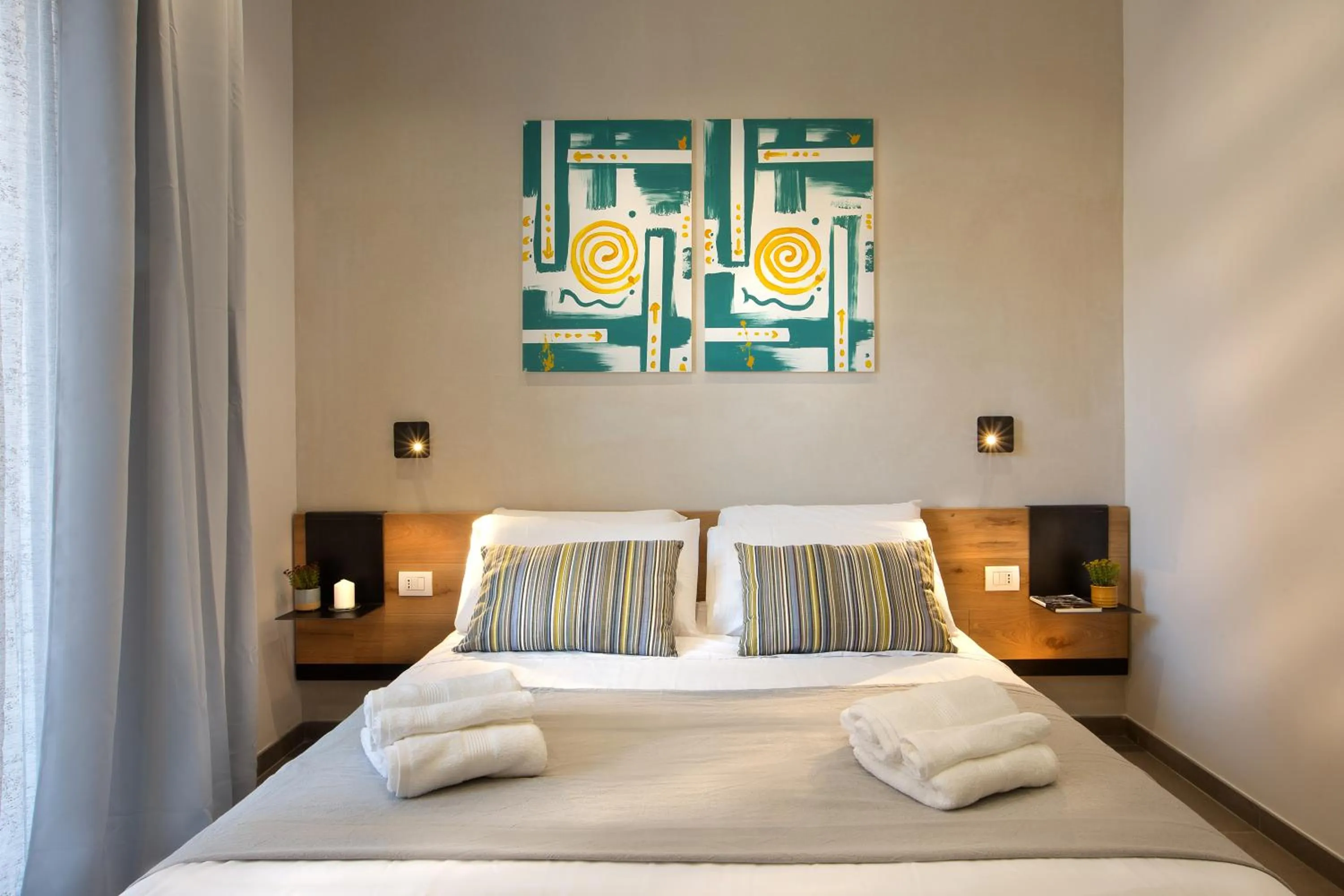 Bed in MARE FUORI ROOMS