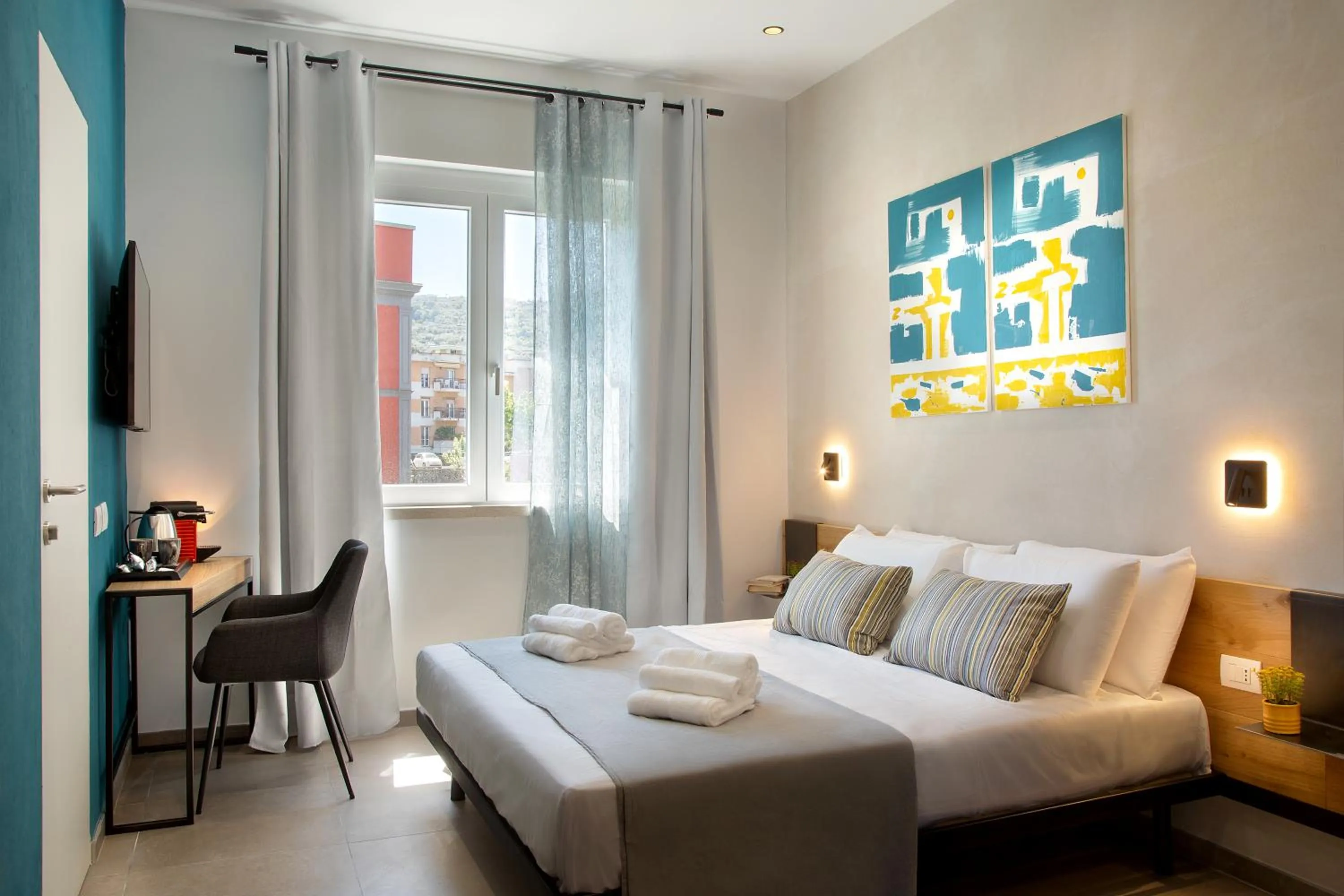 Bed in MARE FUORI ROOMS