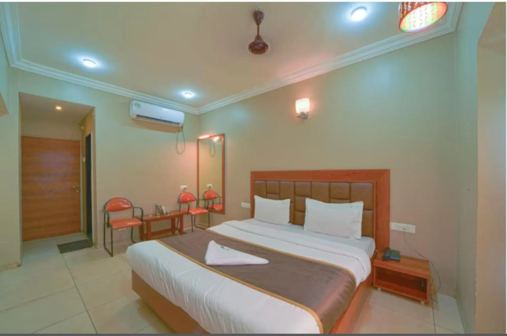 Bed in Hotel Vrindavan Deluxe Kolhapur NEAR CENTRAL BUS STAND