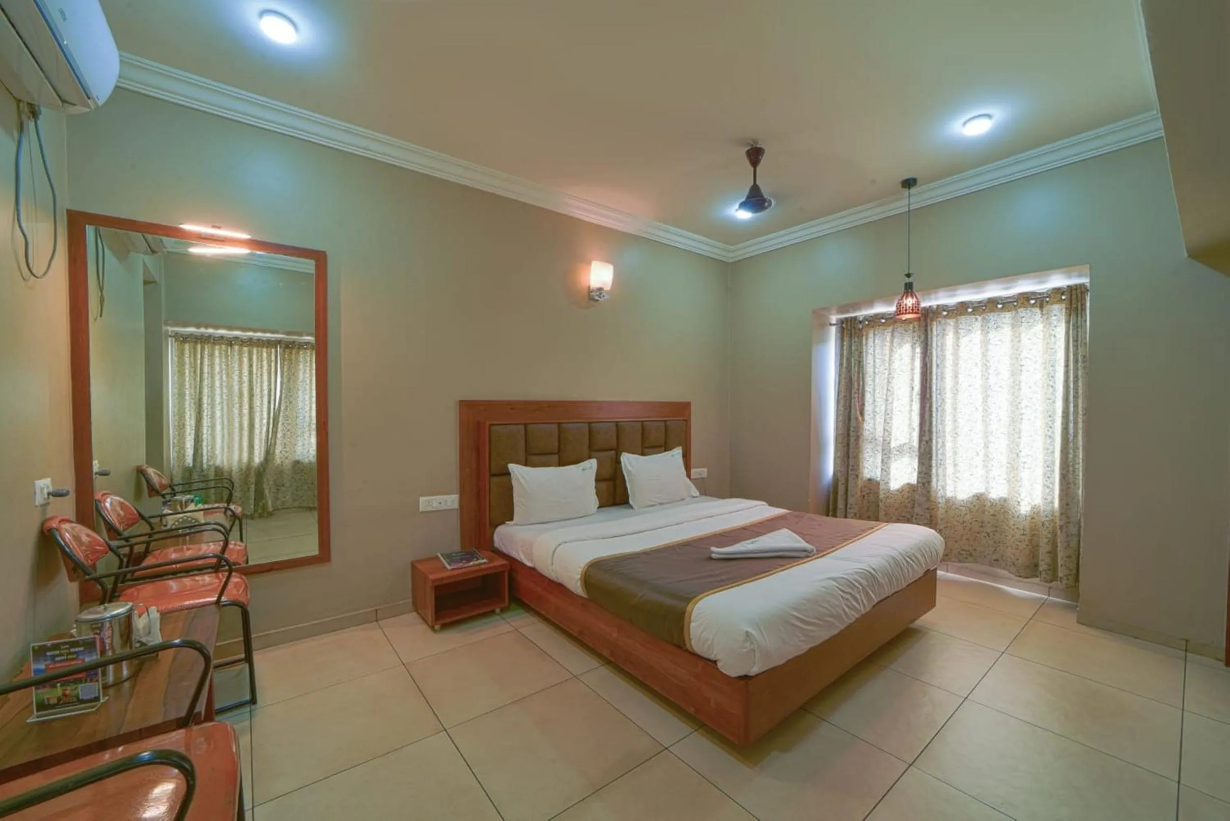 Bed in Hotel Vrindavan Deluxe Kolhapur NEAR CENTRAL BUS STAND