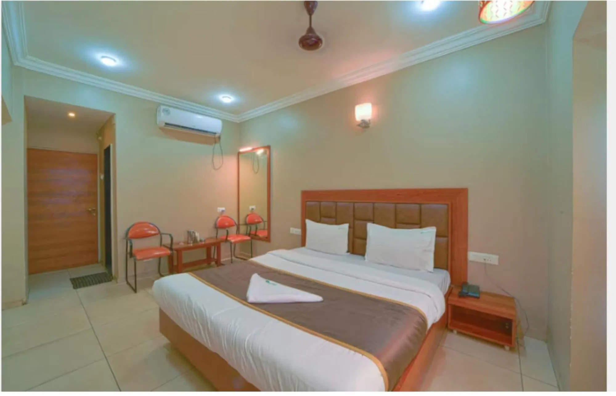 Bed in Hotel Vrindavan Deluxe Kolhapur NEAR CENTRAL BUS STAND