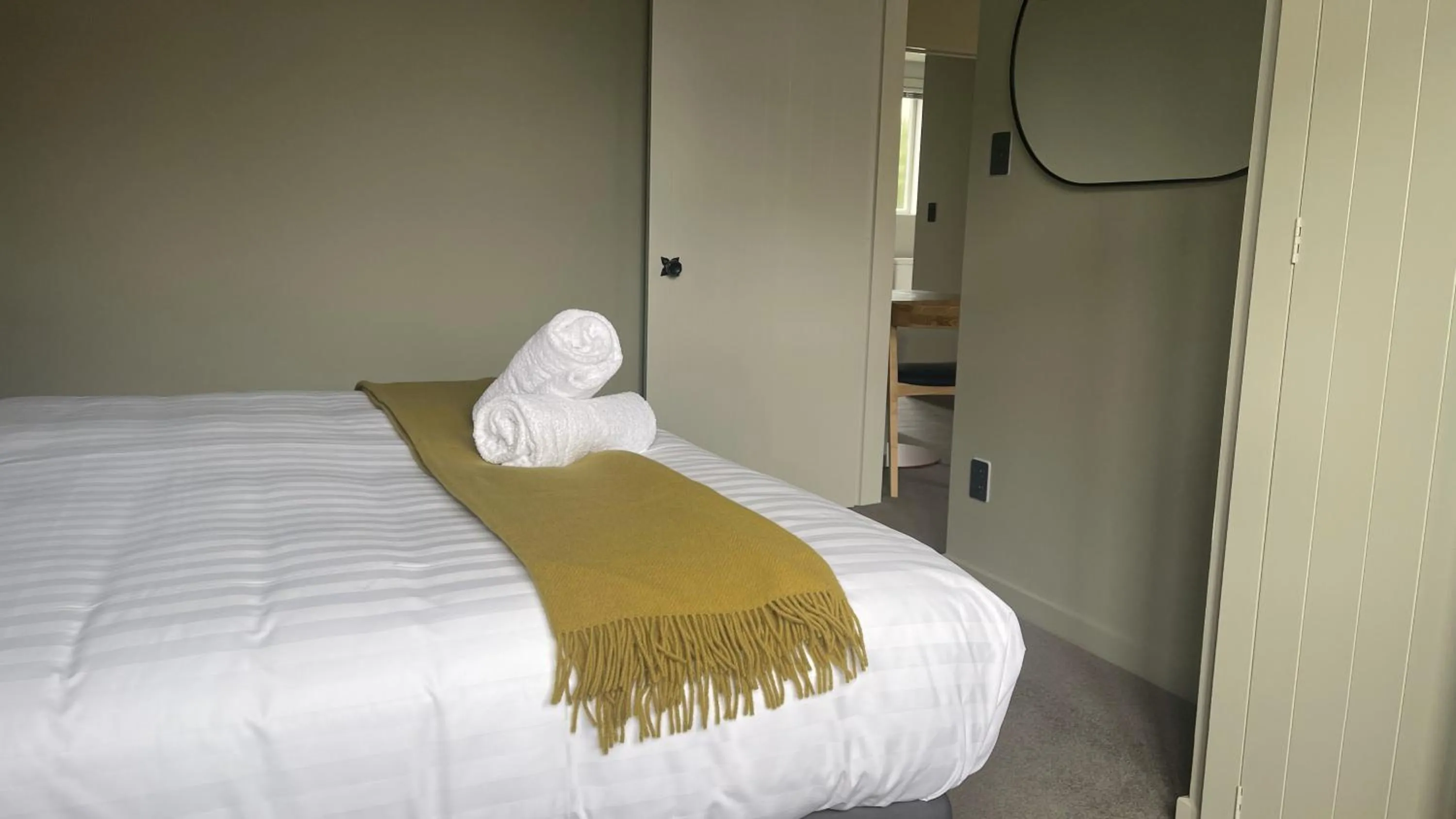 Bed in The Elmwood Motel