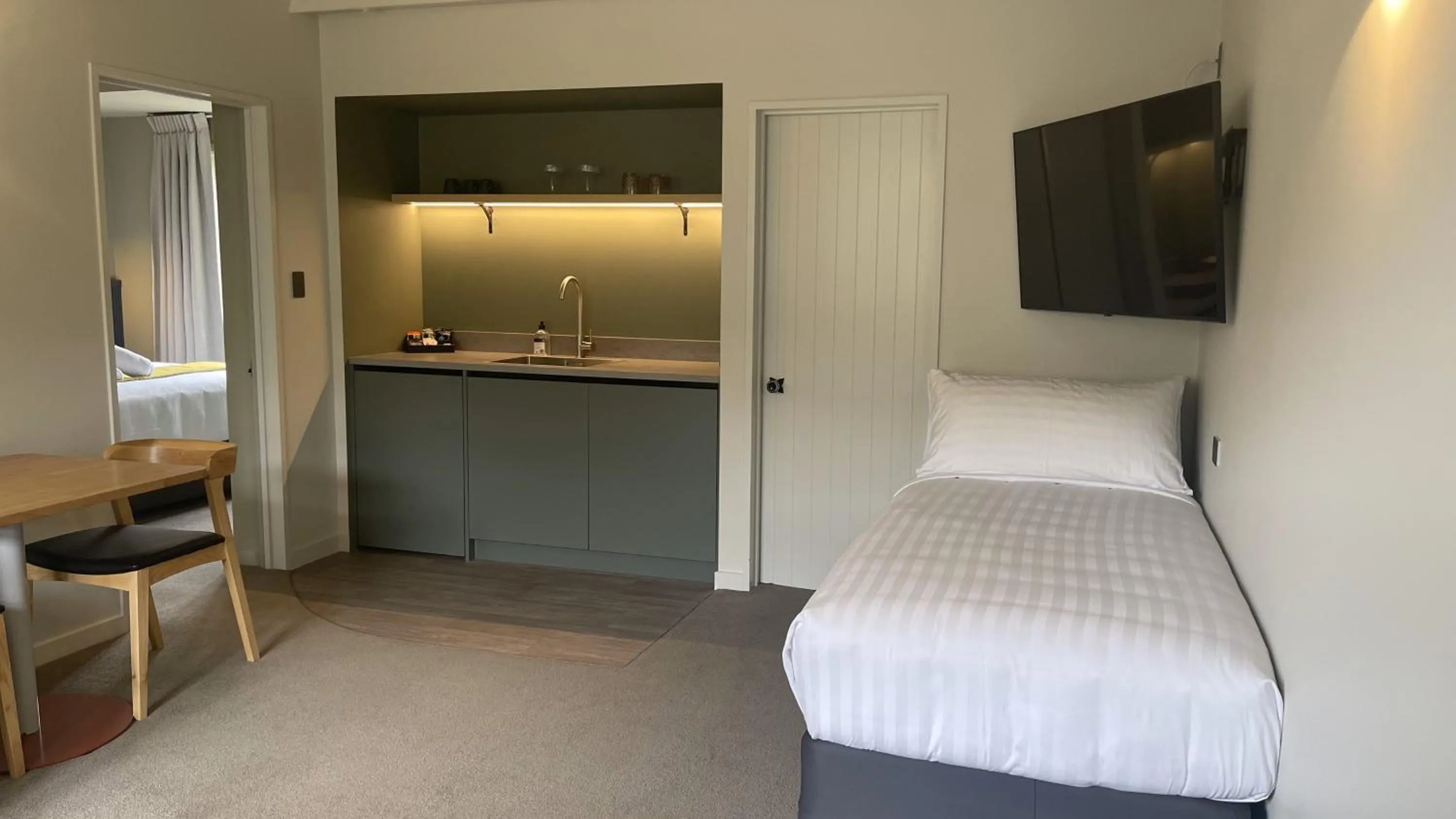 Bed in The Elmwood Motel