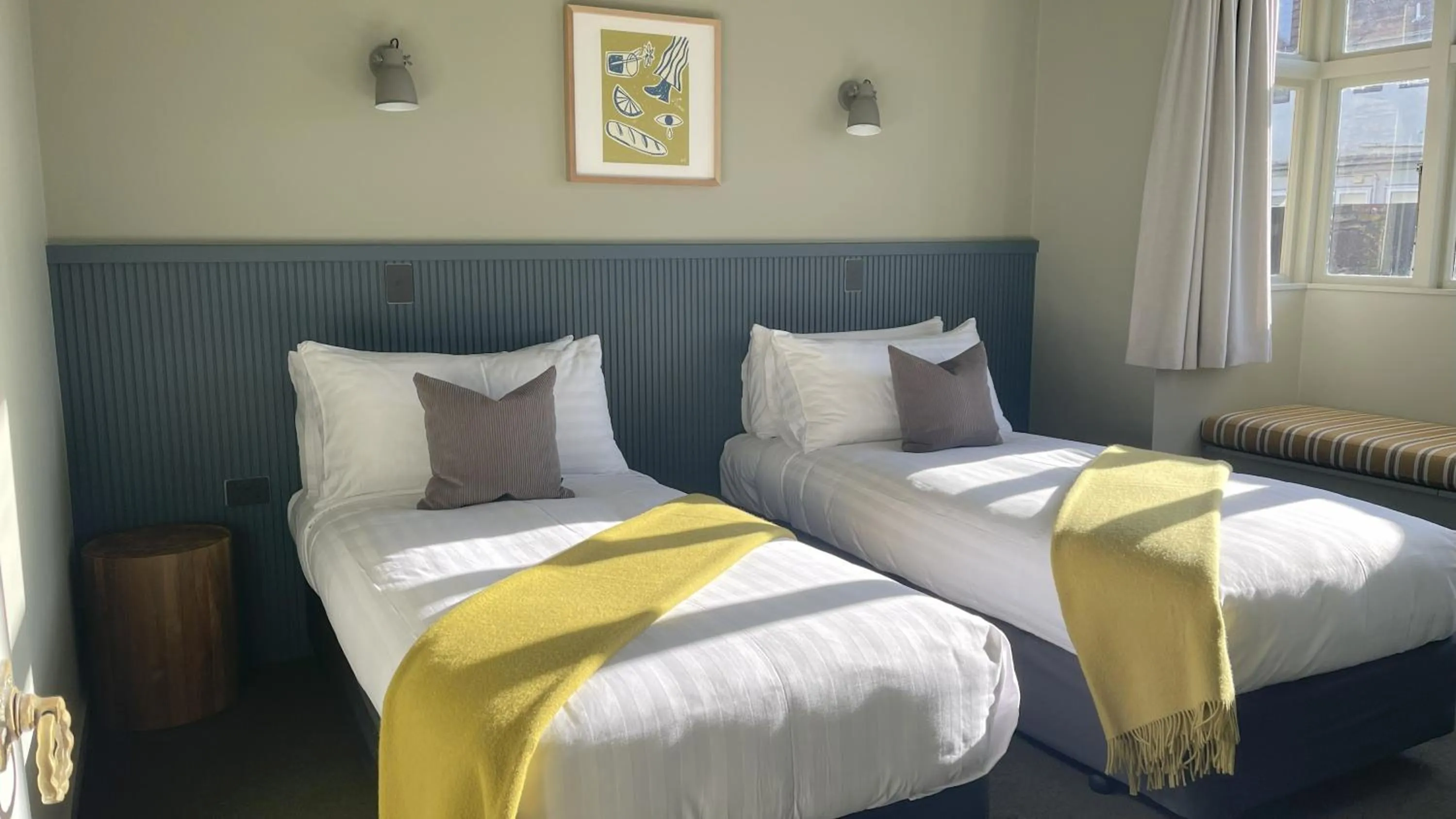 Bed in The Elmwood Motel