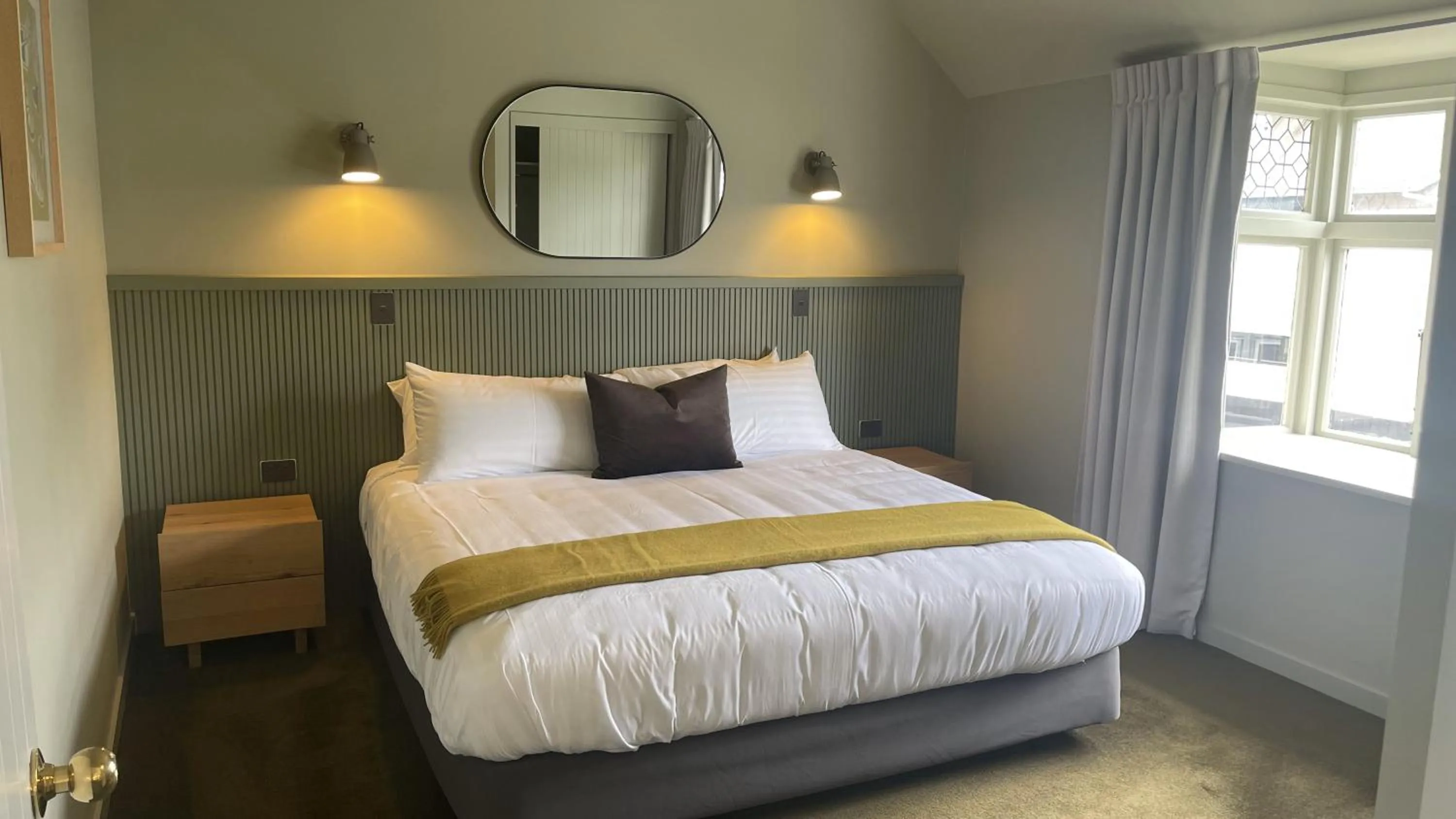 Bed in The Elmwood Motel