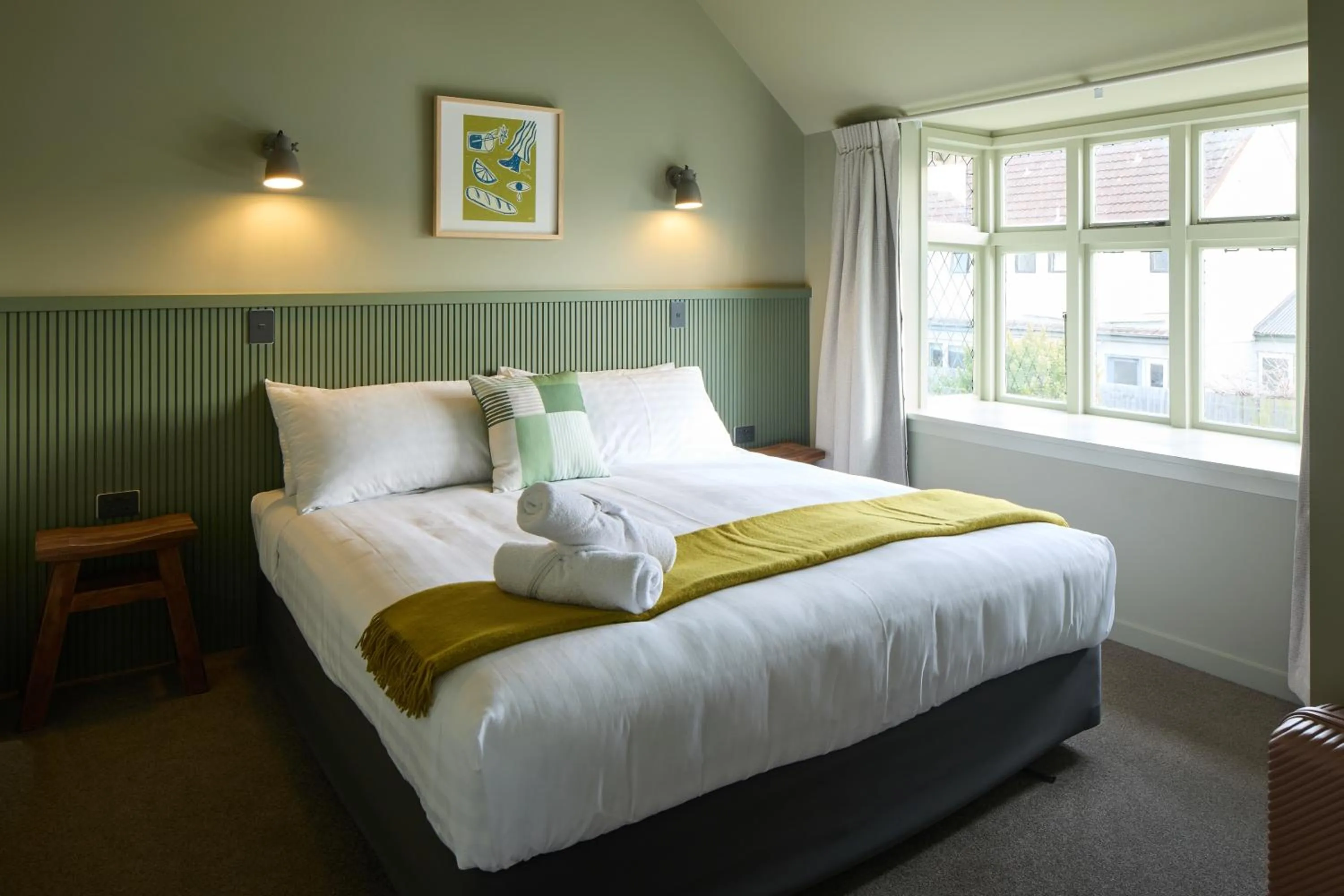 Bed in The Elmwood Motel