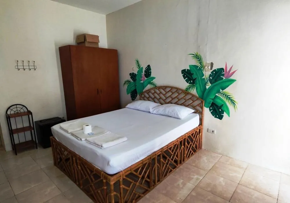 Bed in Bluewaves Resort - Basdaku by Hiverooms