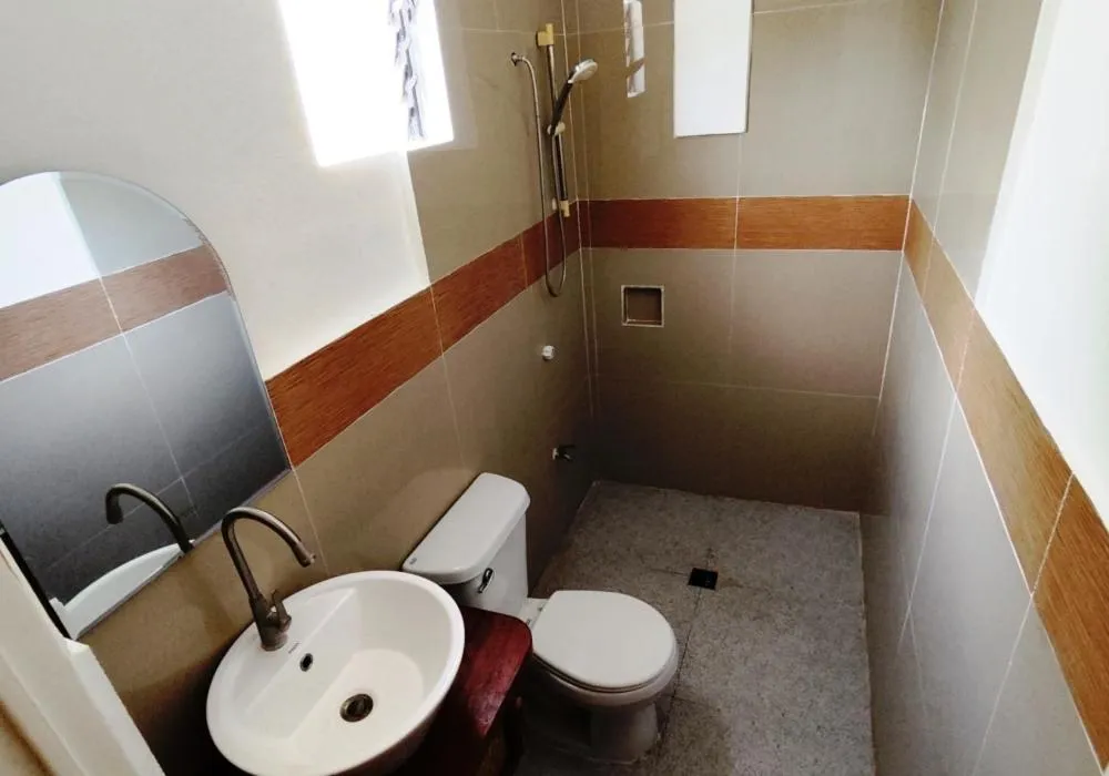 Shower in Bluewaves Resort - Basdaku by Hiverooms