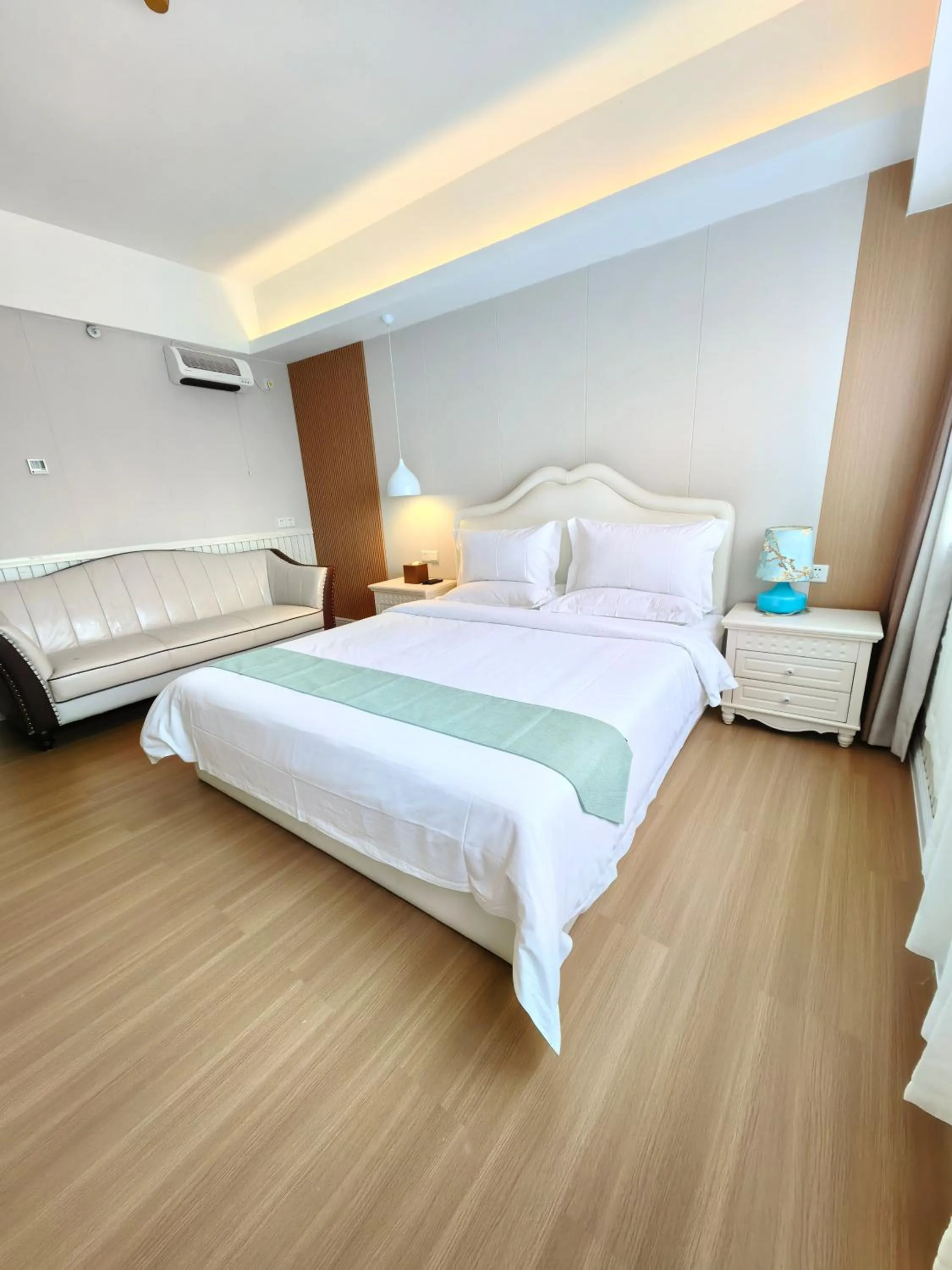 Bedroom, Bed in Mihua International Apartment