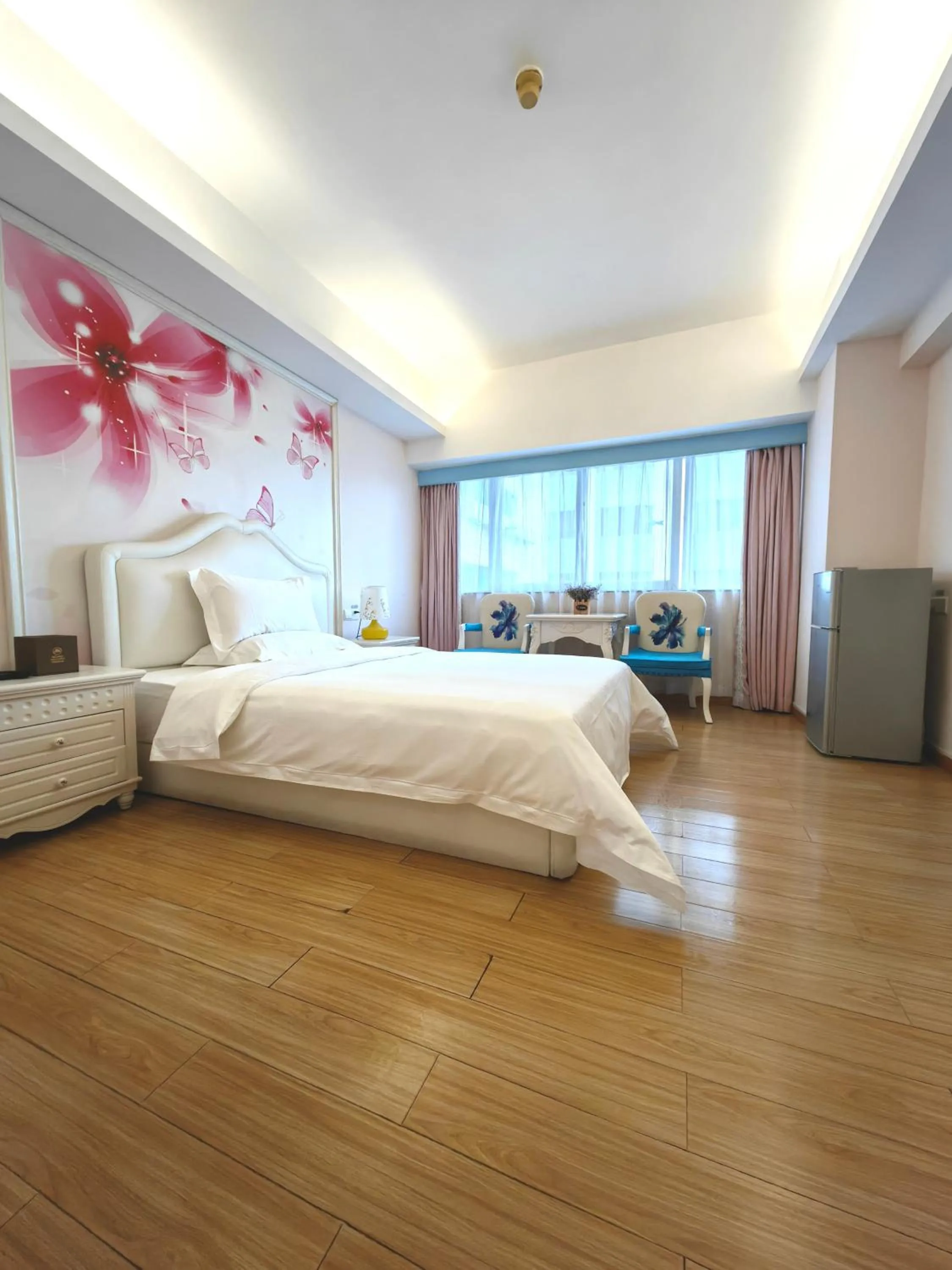 Bed in Mihua International Apartment