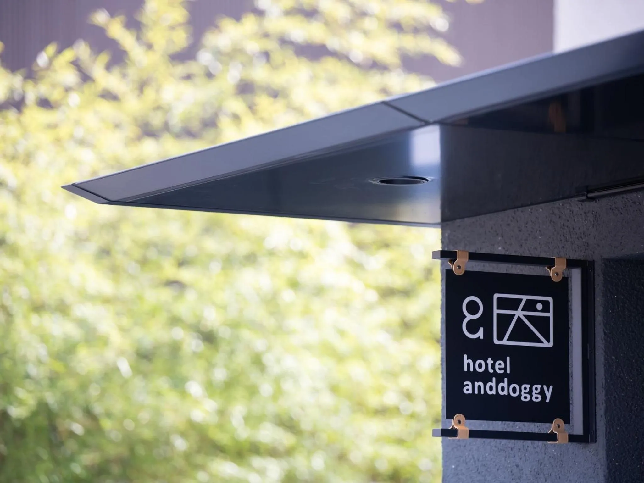 Property logo or sign in hotel anddoggy Kyoto Nijo