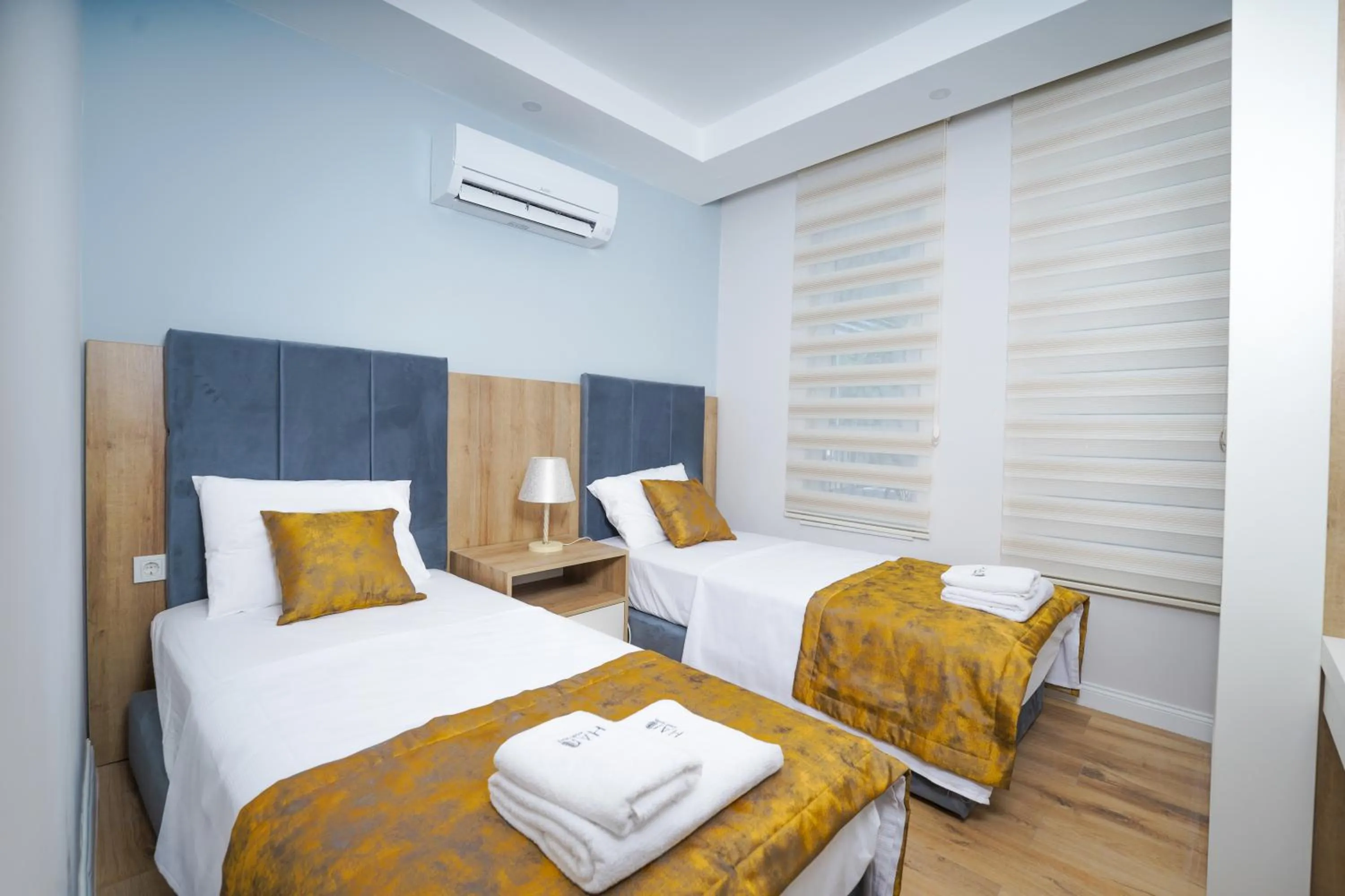 Bed in Han Apart Hotel Side