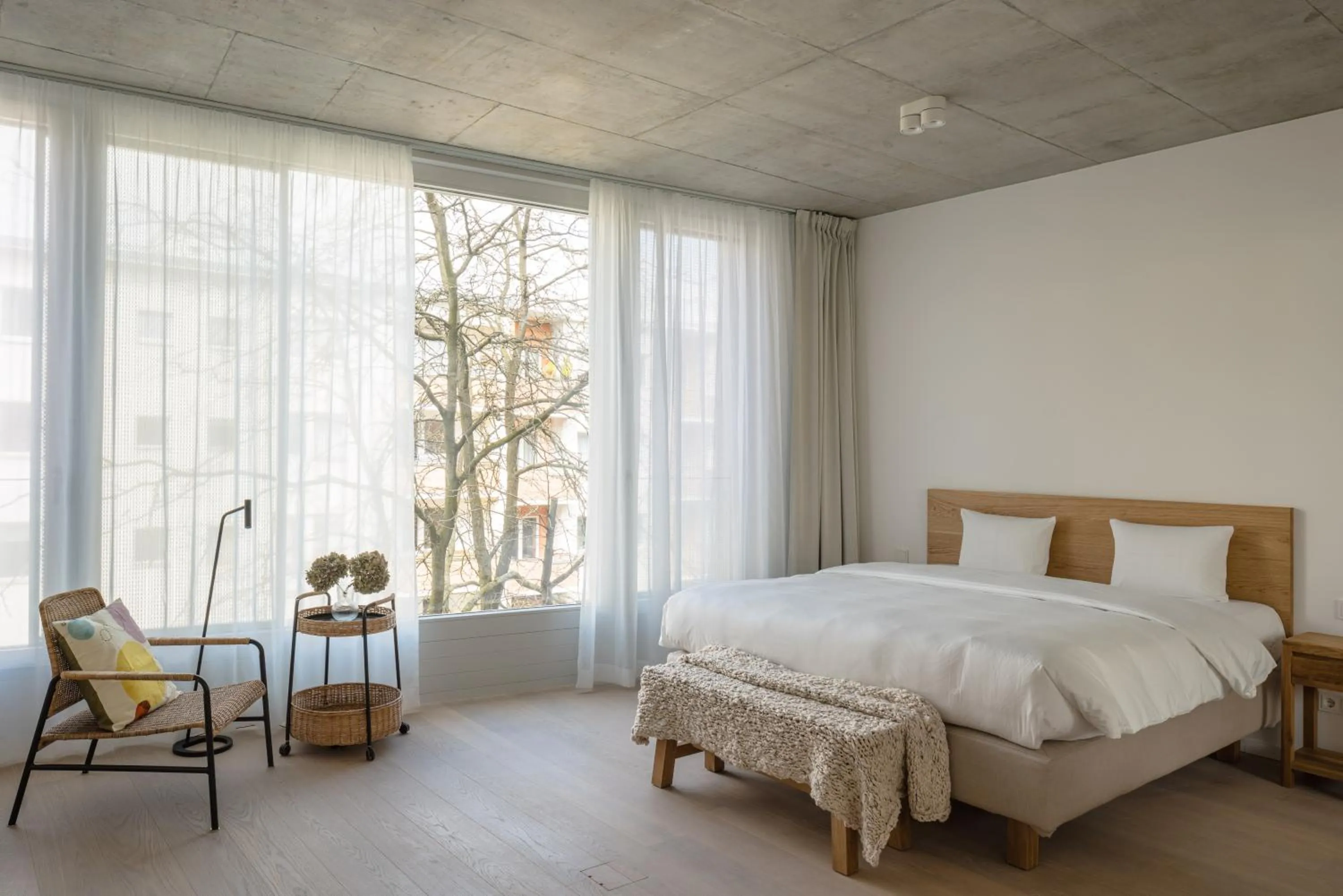 Seating area, Bed in Wilmina Apartments & Lofts