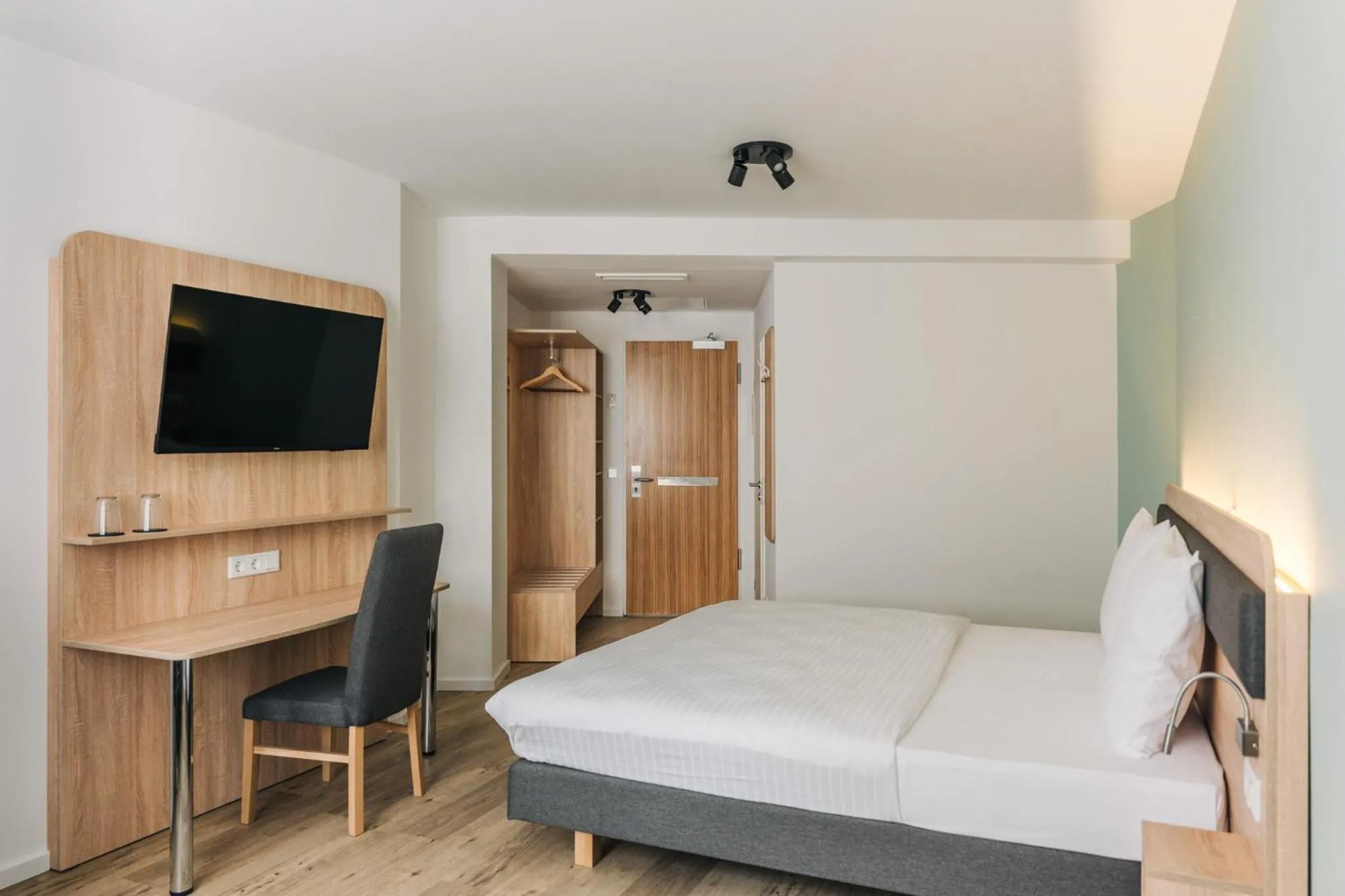 Bed in Homaris Corner Hotel