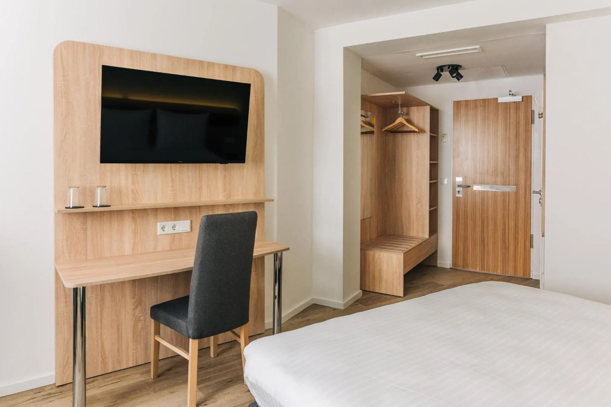 Bed in Homaris Corner Hotel