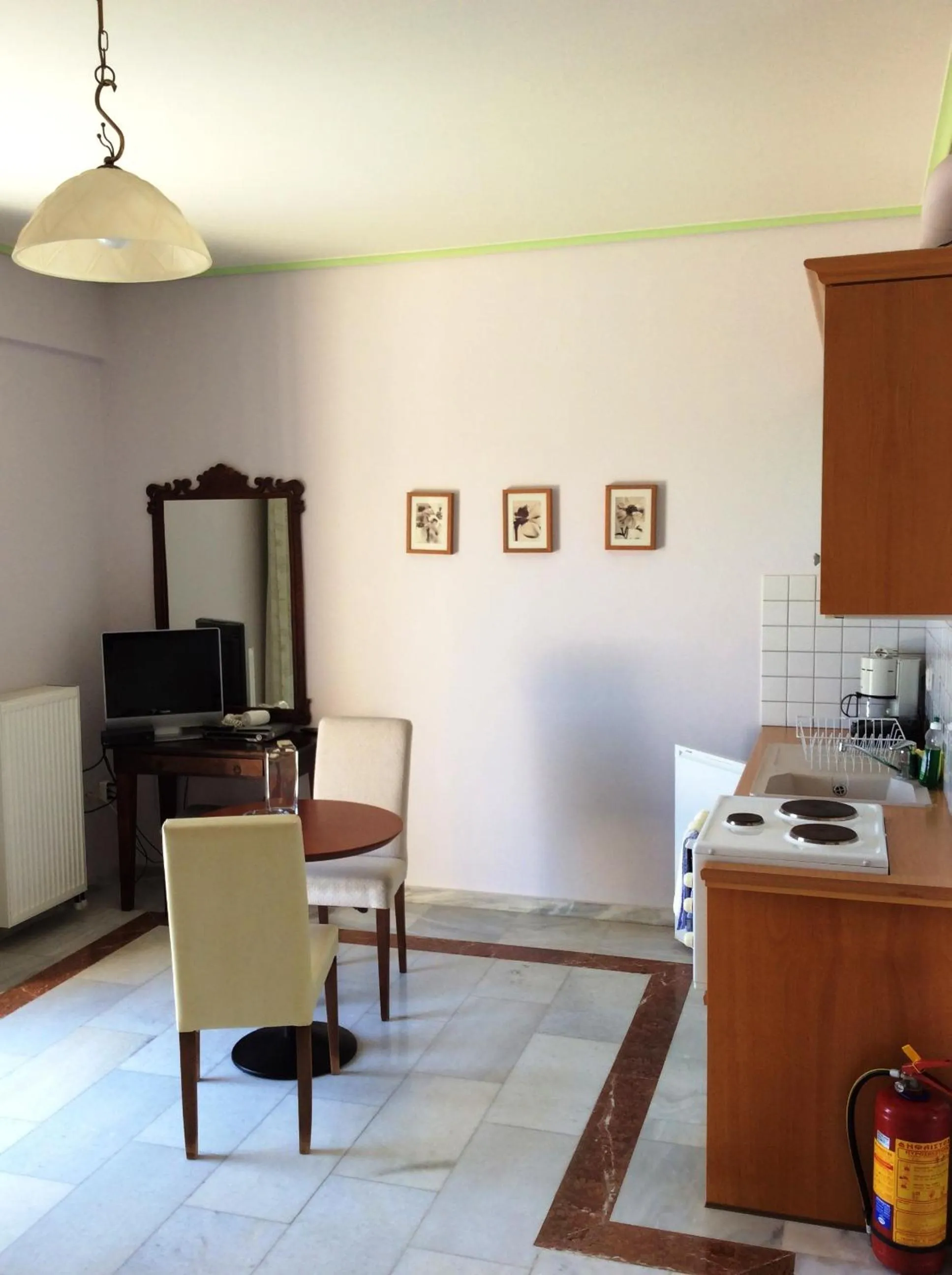 Kitchen or kitchenette in Angelica Villas Hotel Apartments