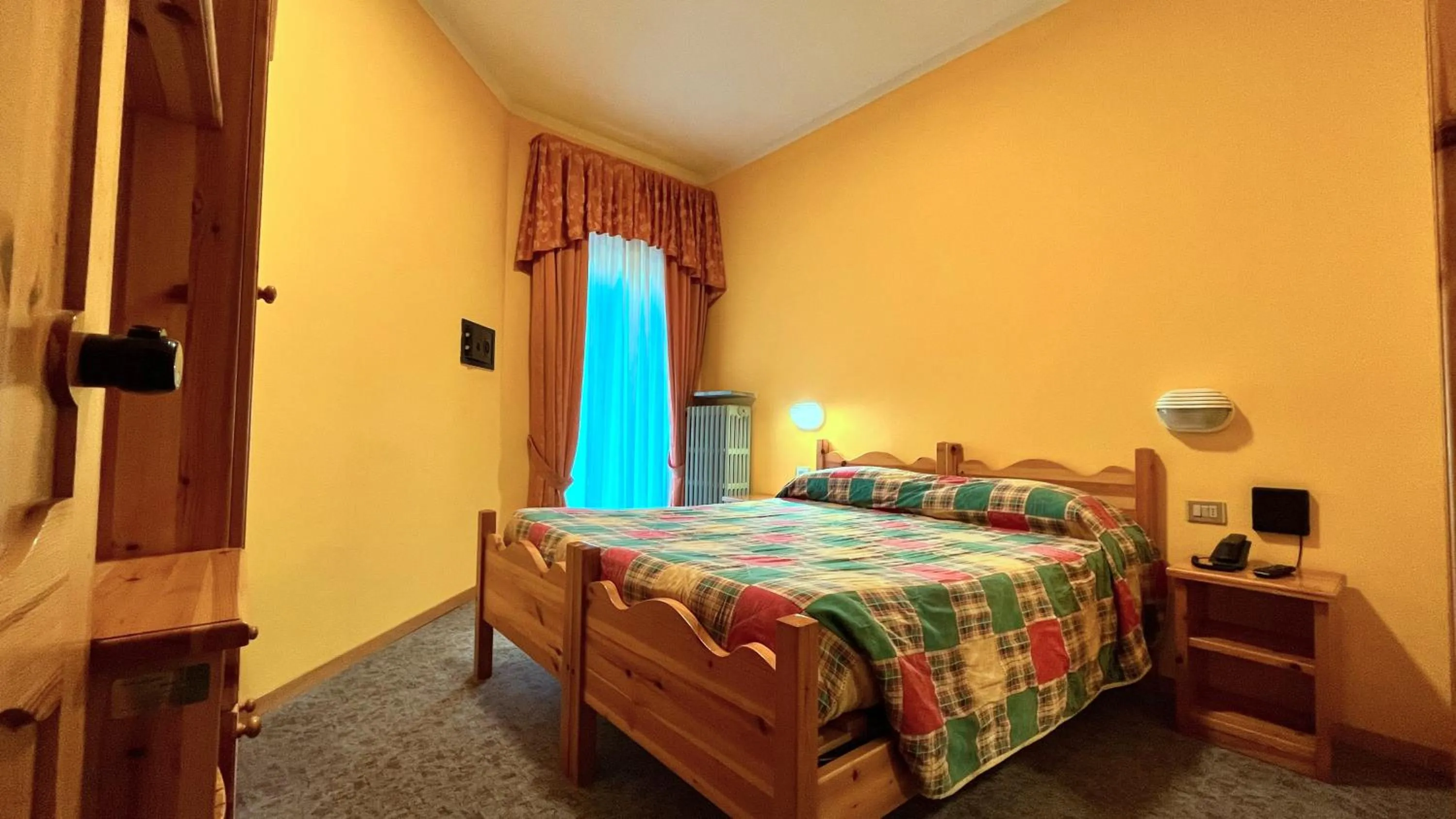 Bed in Hotel Le Pinete