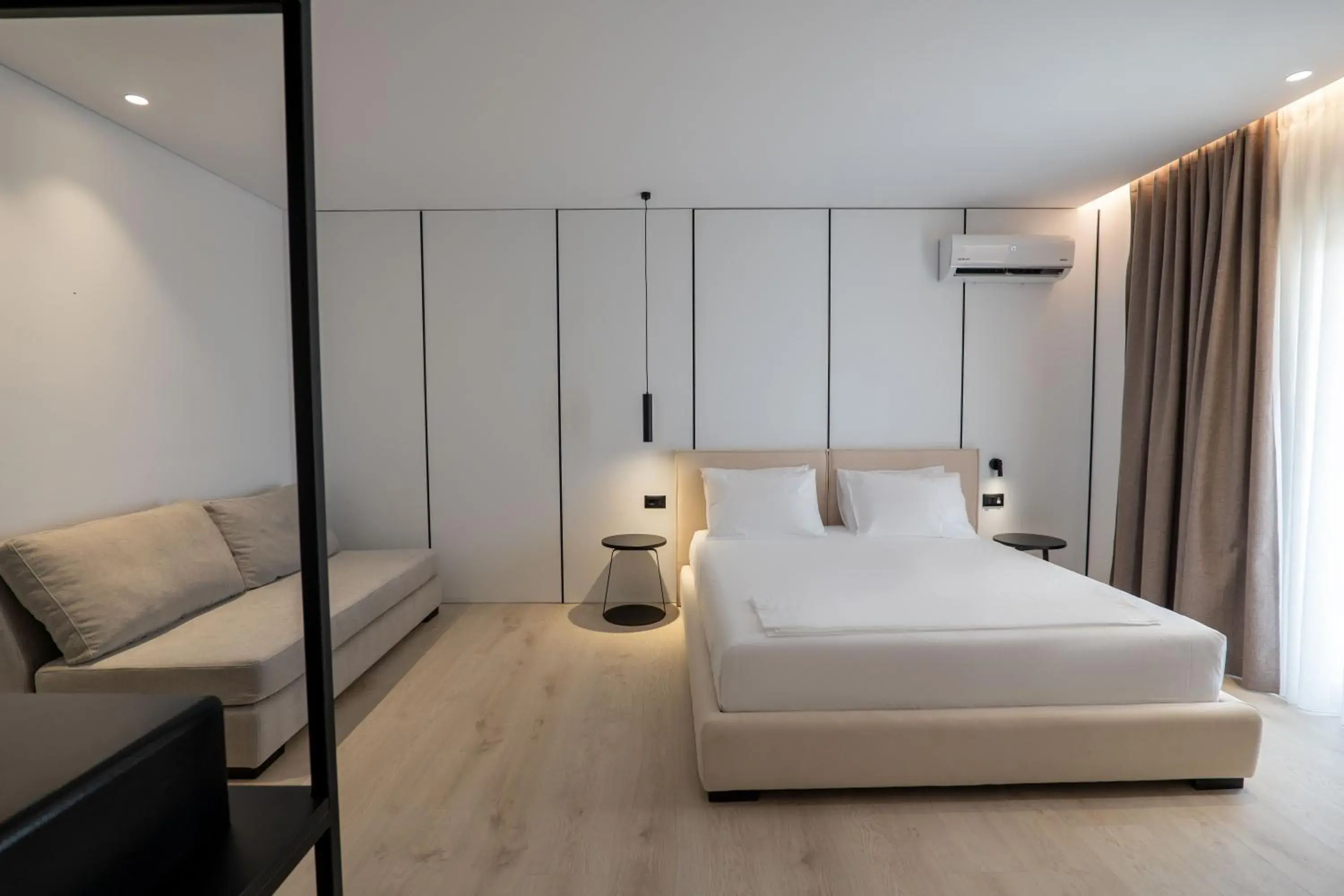 Triple Room with Side Sea View in Arrei Hotel Triple Room with Side Sea View in Arrei Hotel