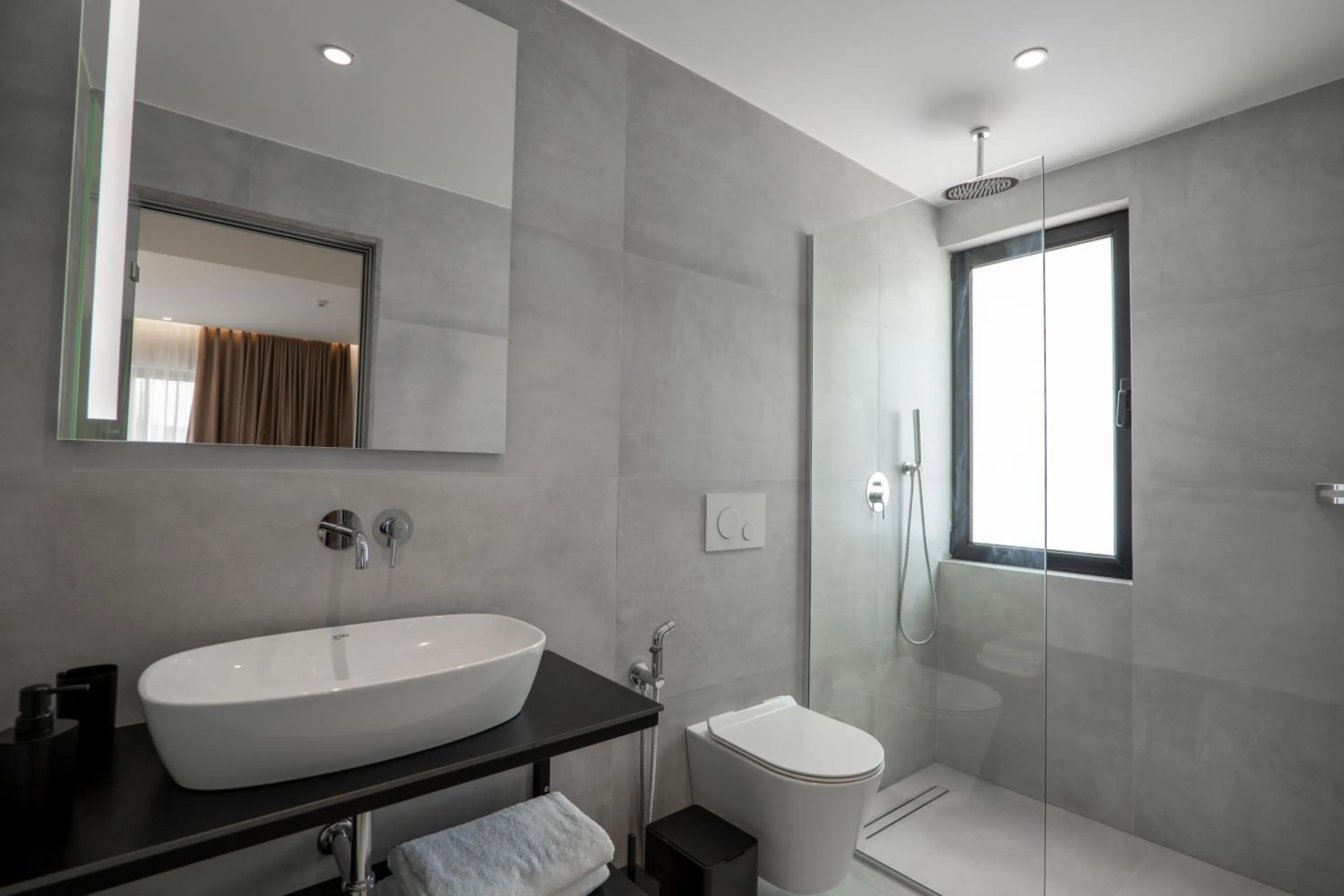 Bathroom in Arrei Hotel