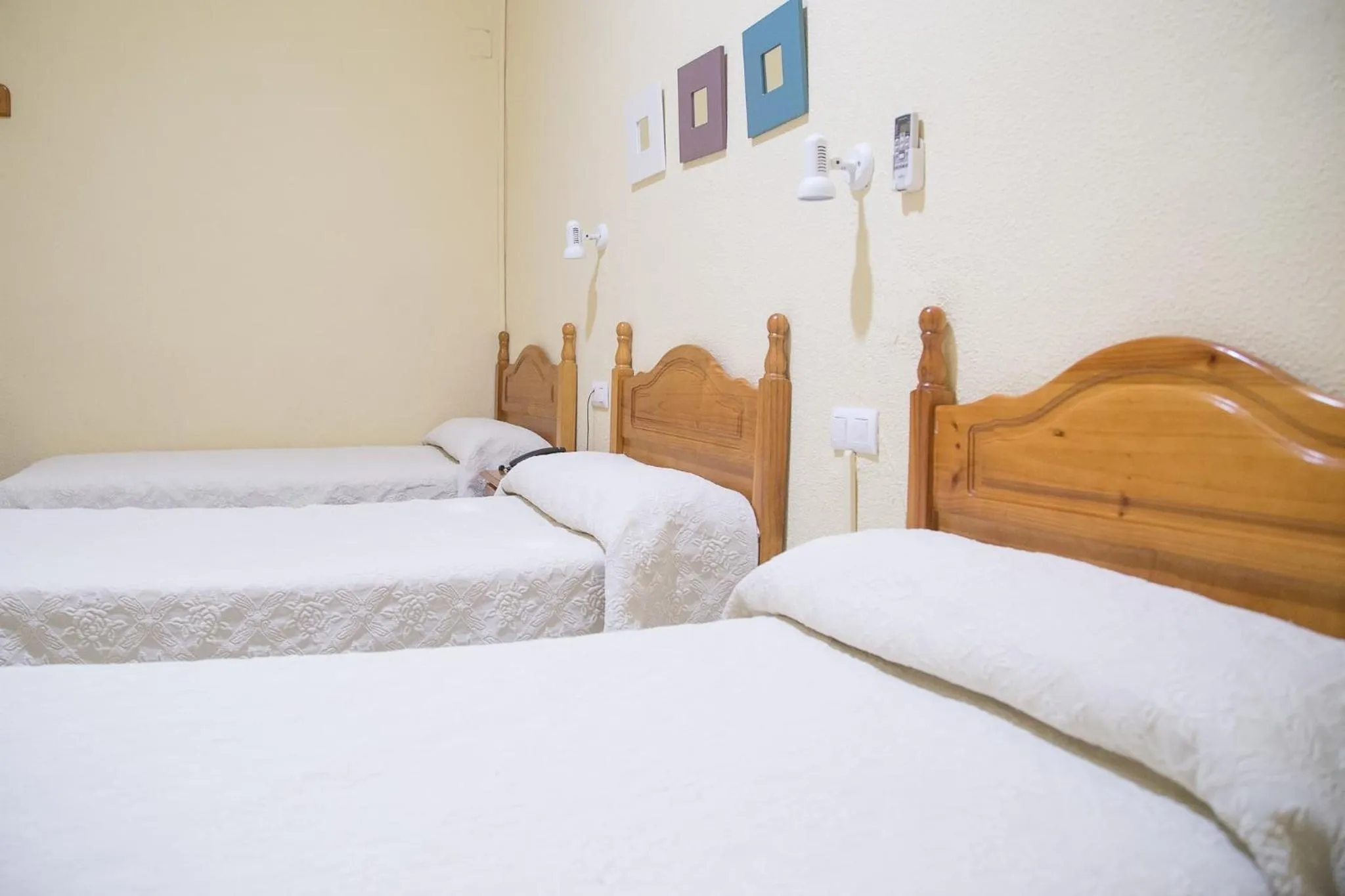 Bed in Hostal Sierpes