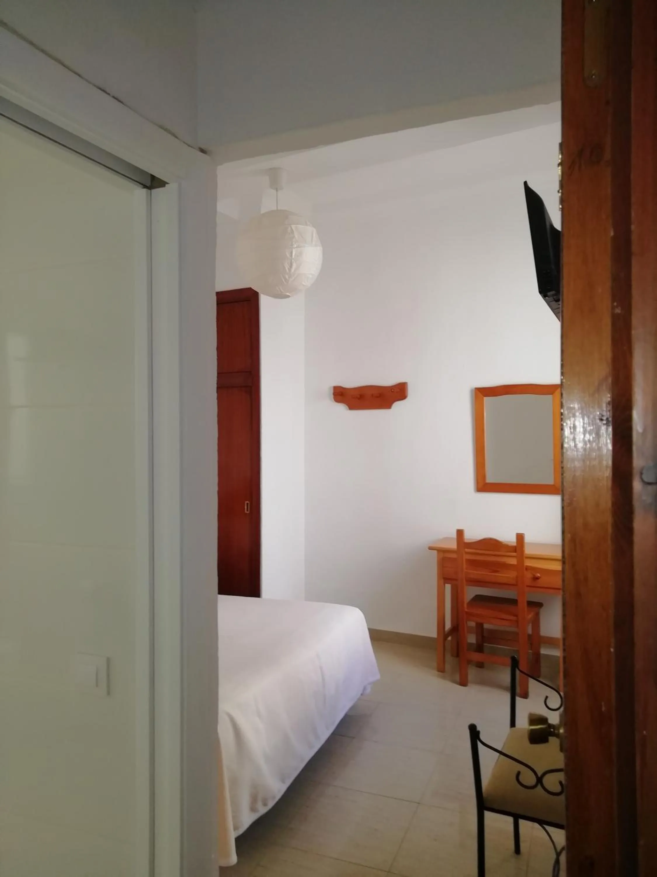 Bed in Hostal Sierpes