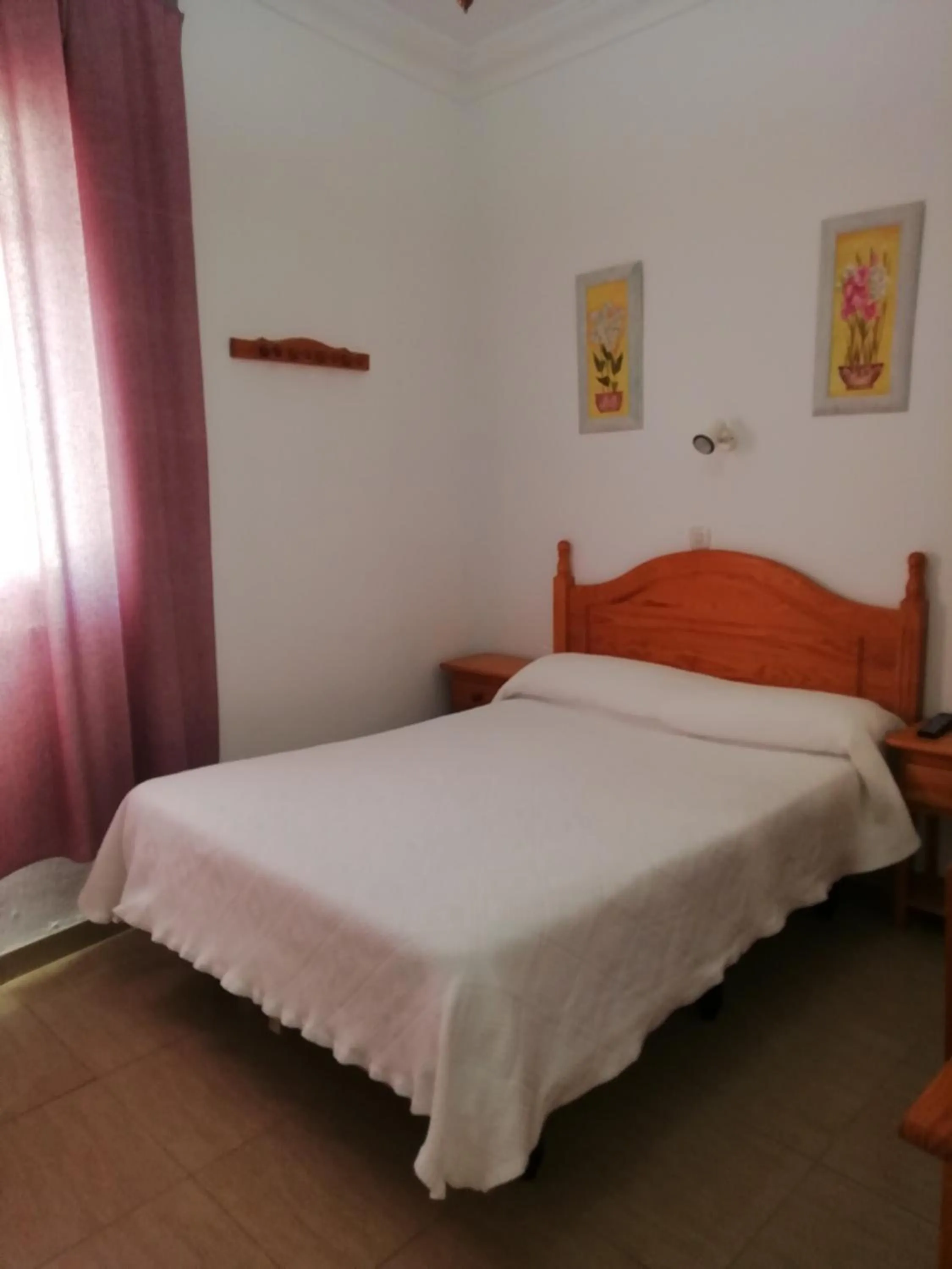 Bed in Hostal Sierpes