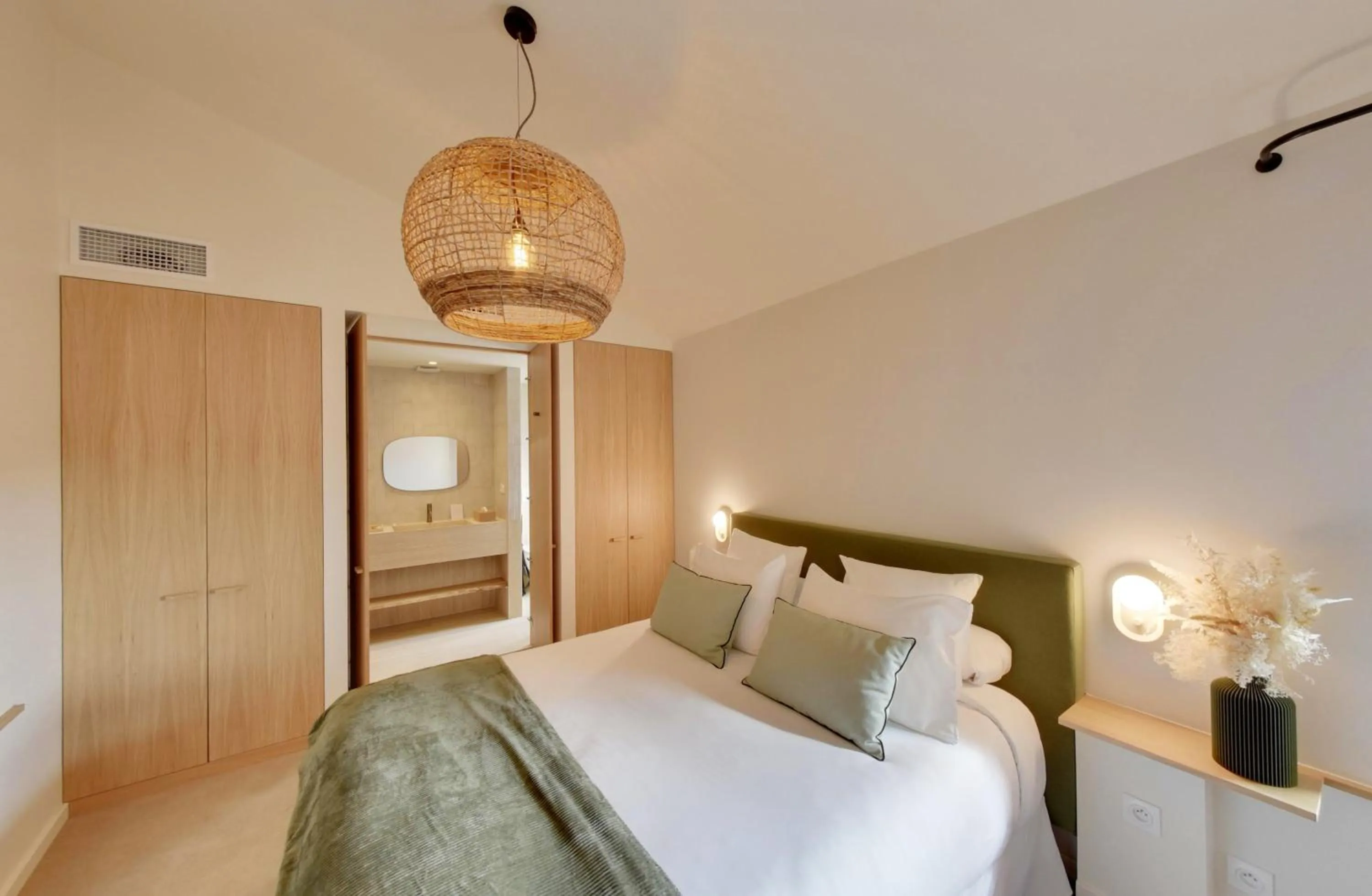 Bed in La Maison Gaïa Hôtel & Spa