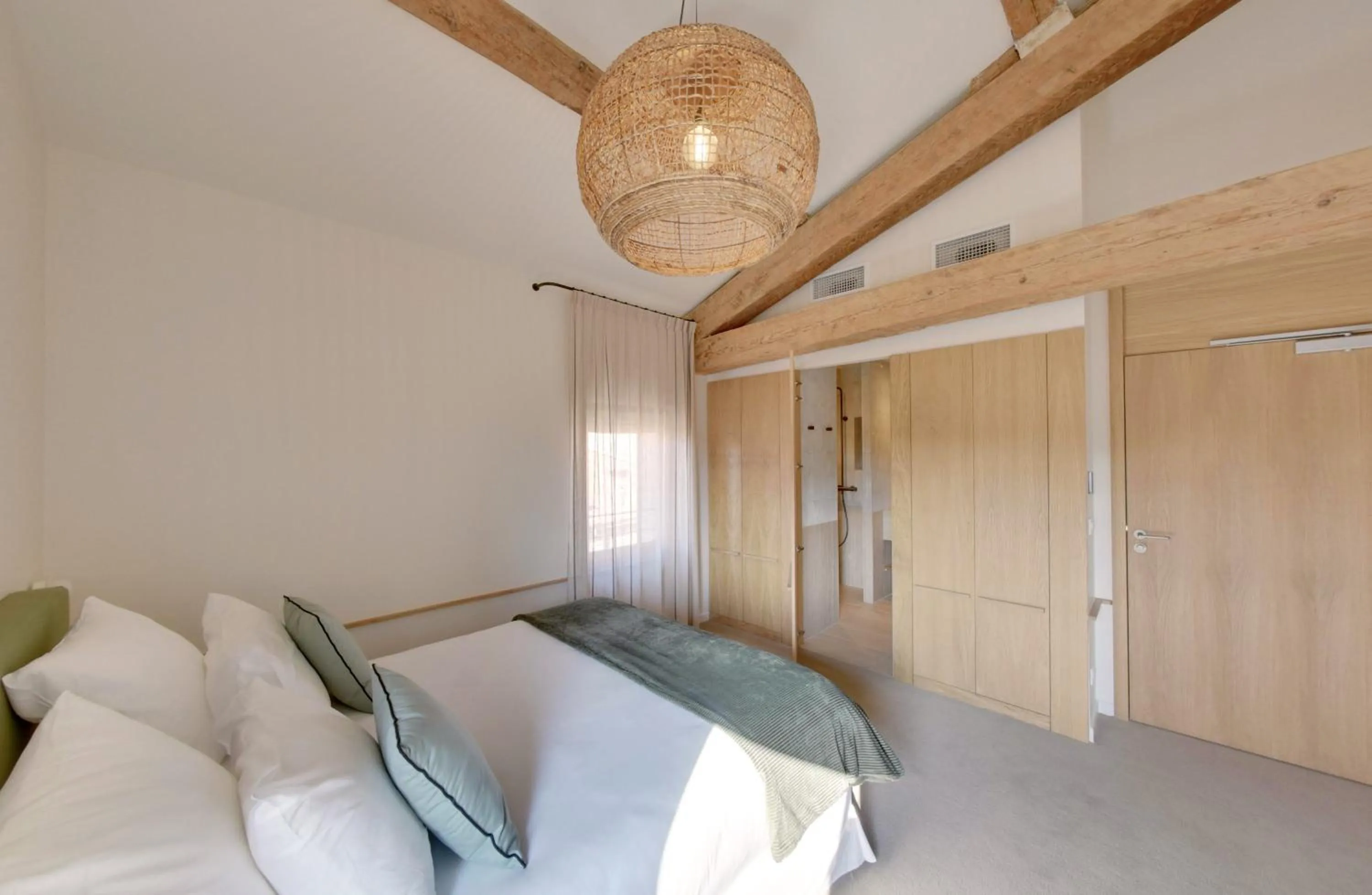 Bed in La Maison Gaïa Hôtel & Spa