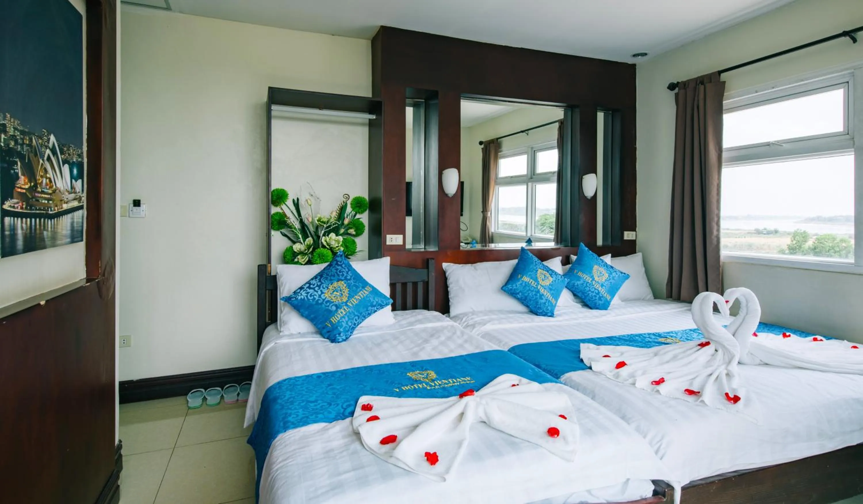 Photo of the whole room, Bed in V Hotel Vientiane