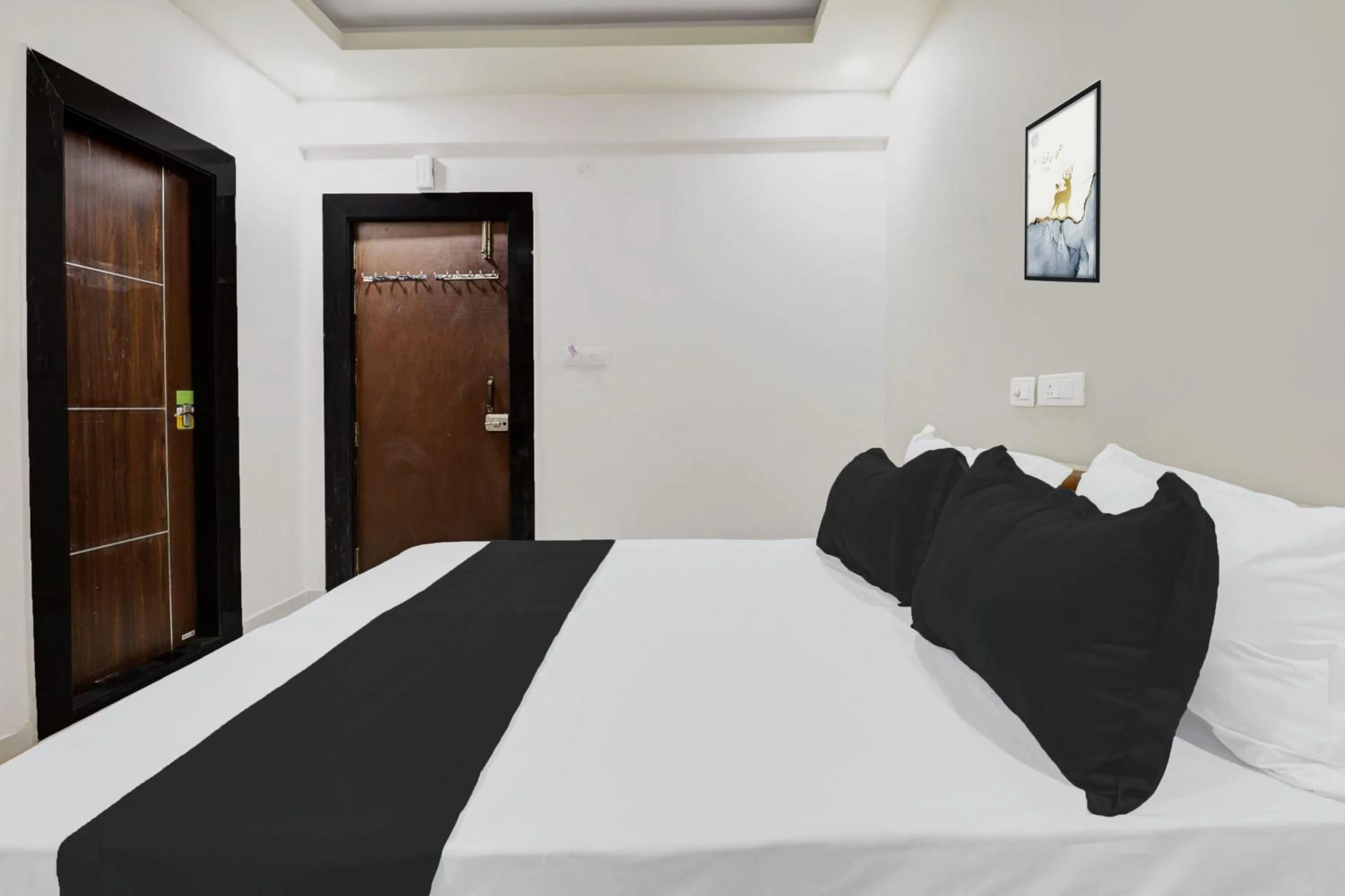 Bedroom in Hotel O Sri Harshitha Grand Near Zudio - Star Bazaar, Kundalhalli Gate