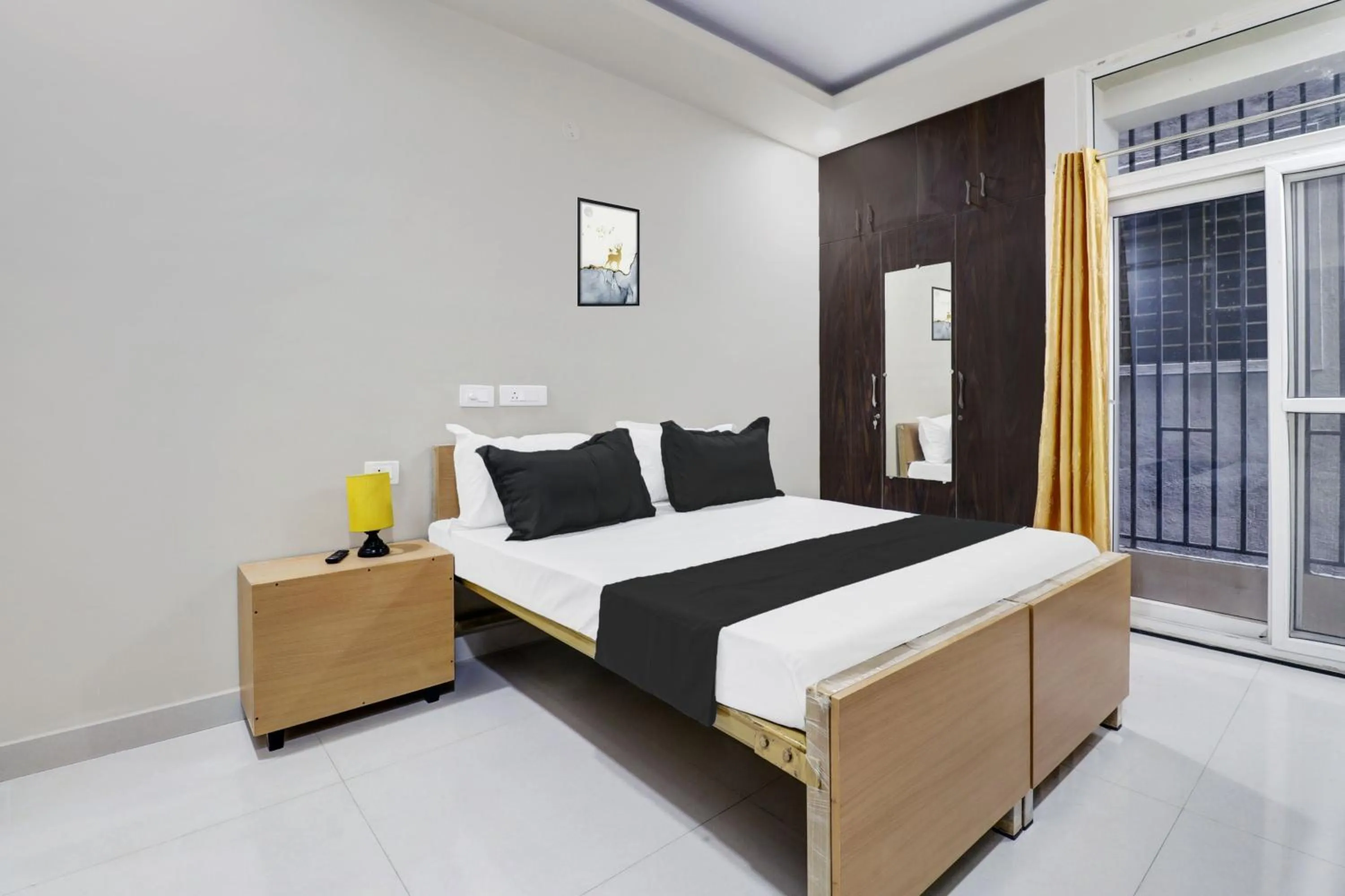 Bedroom in Hotel O Sri Harshitha Grand Near Zudio - Star Bazaar, Kundalhalli Gate
