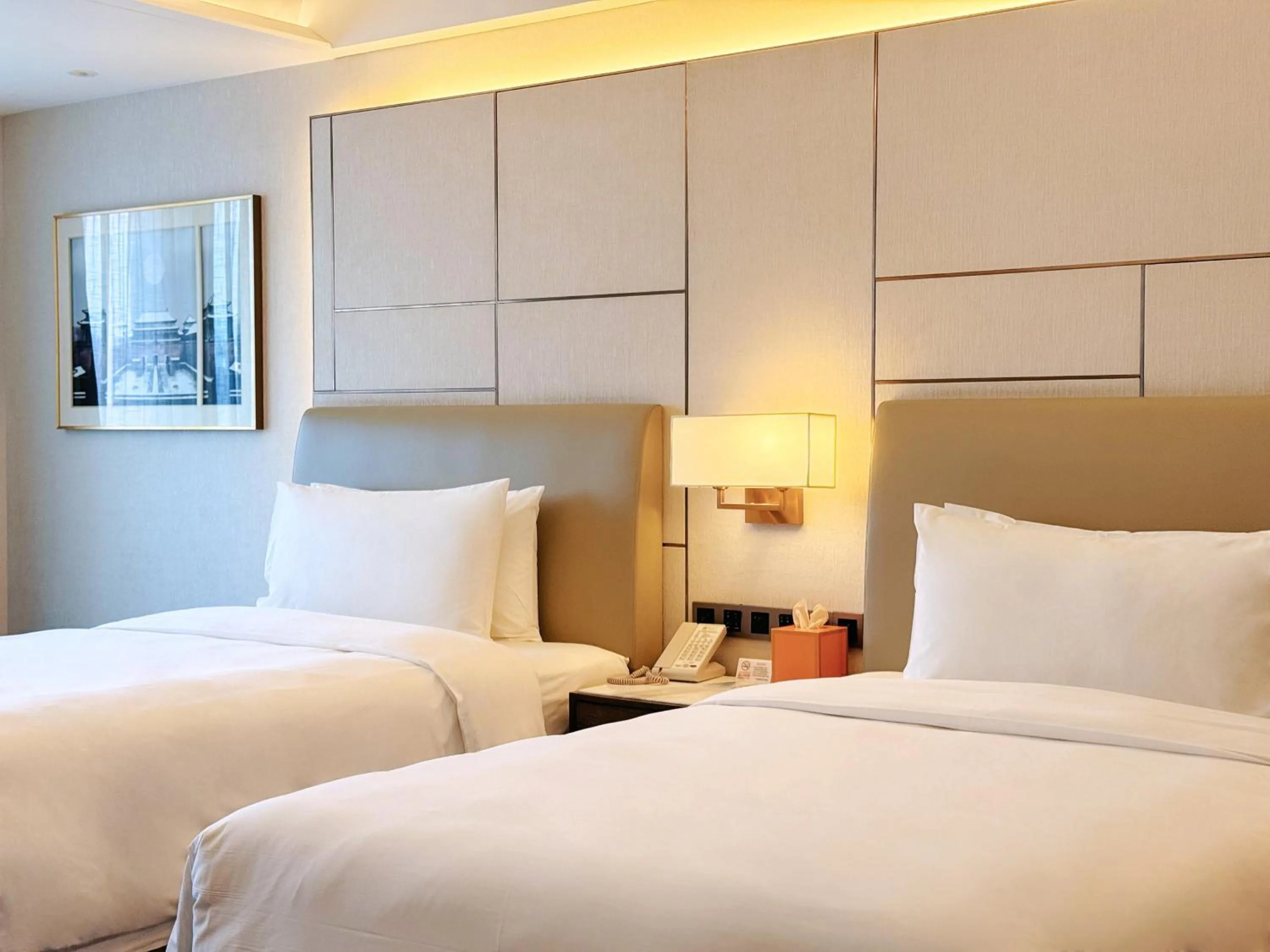 Bed in Beijing Xiamenair Jianianhua Hotel