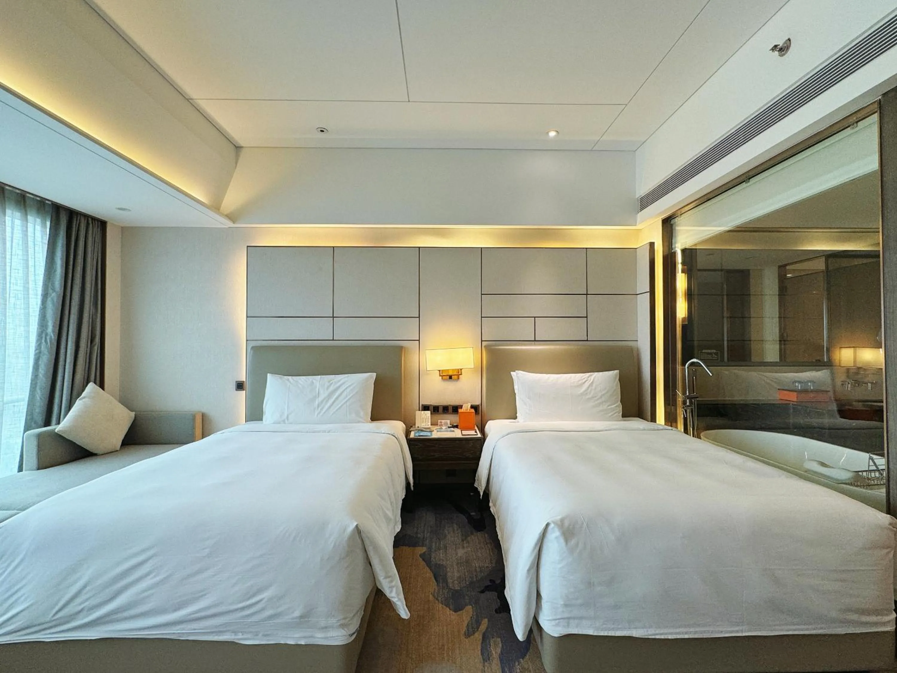 Bed in Beijing Xiamenair Jianianhua Hotel