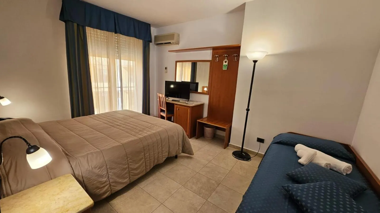 Photo of the whole room, Bed in GH Hotel