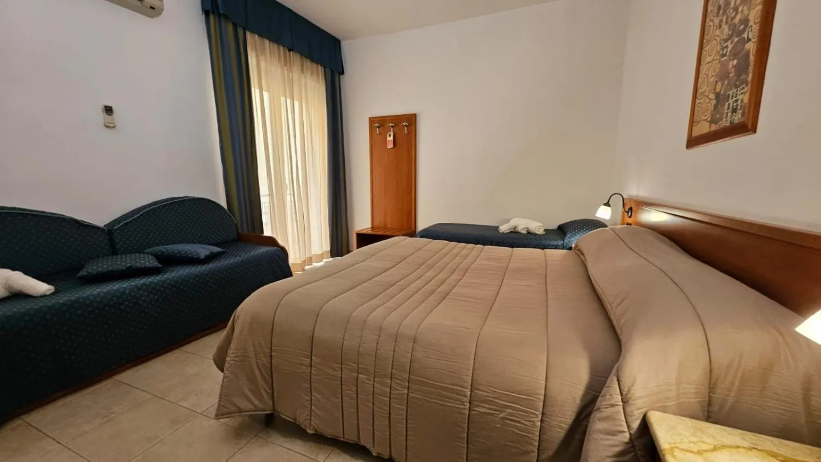 Photo of the whole room, Bed in GH Hotel